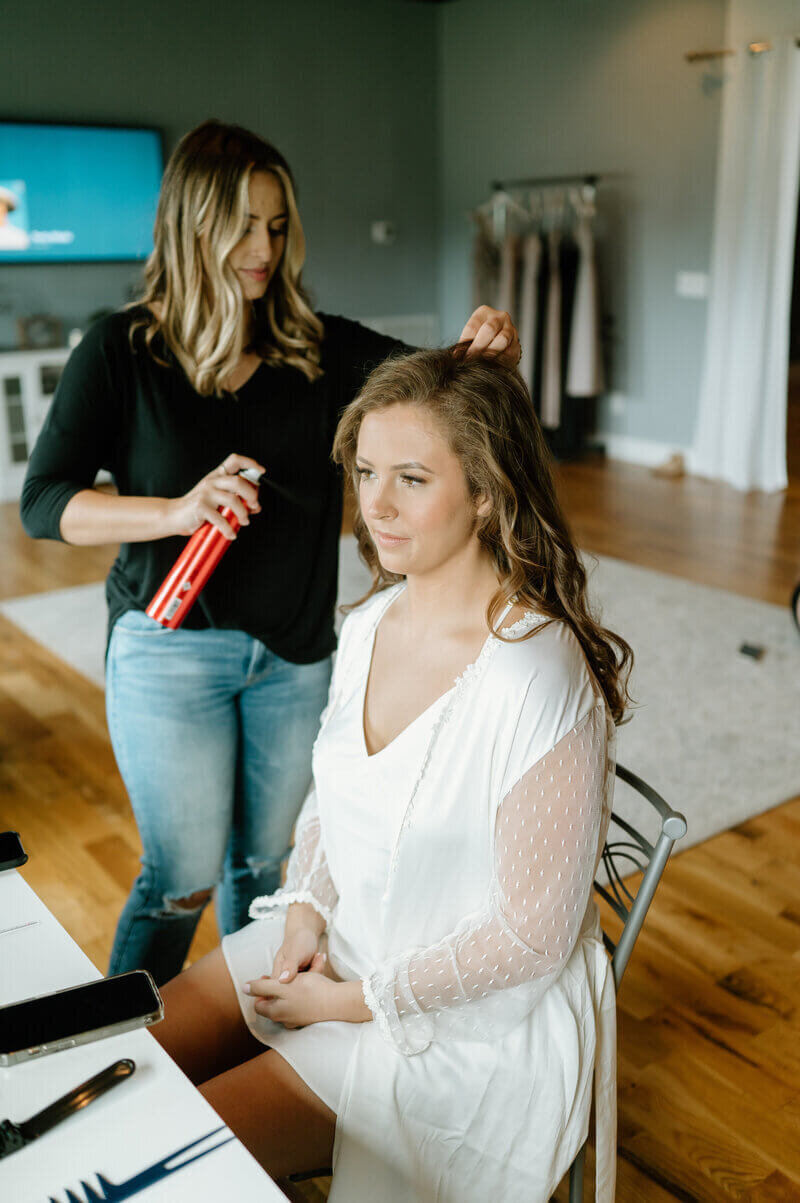 bride getting makeup done taken by lexington wedding photographer