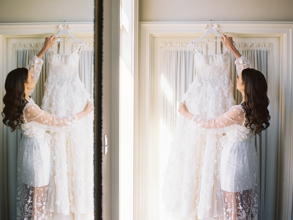 bride hanging her dress up