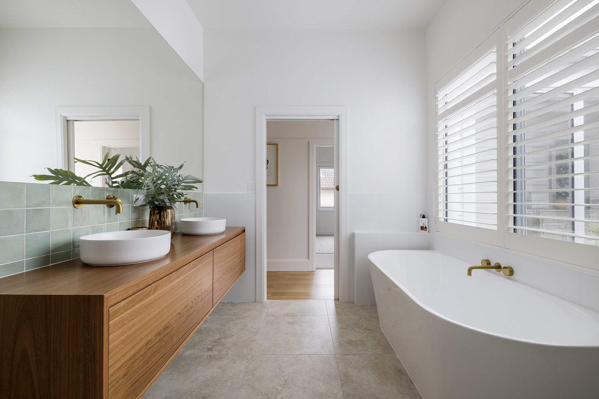 Bathroom design sage green tile and timber vanity