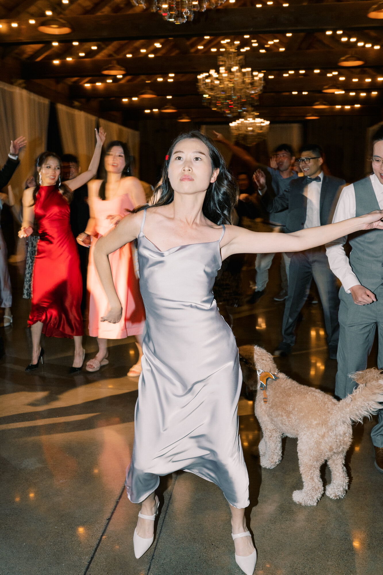 bridesmaid dancing on dance floor in dark