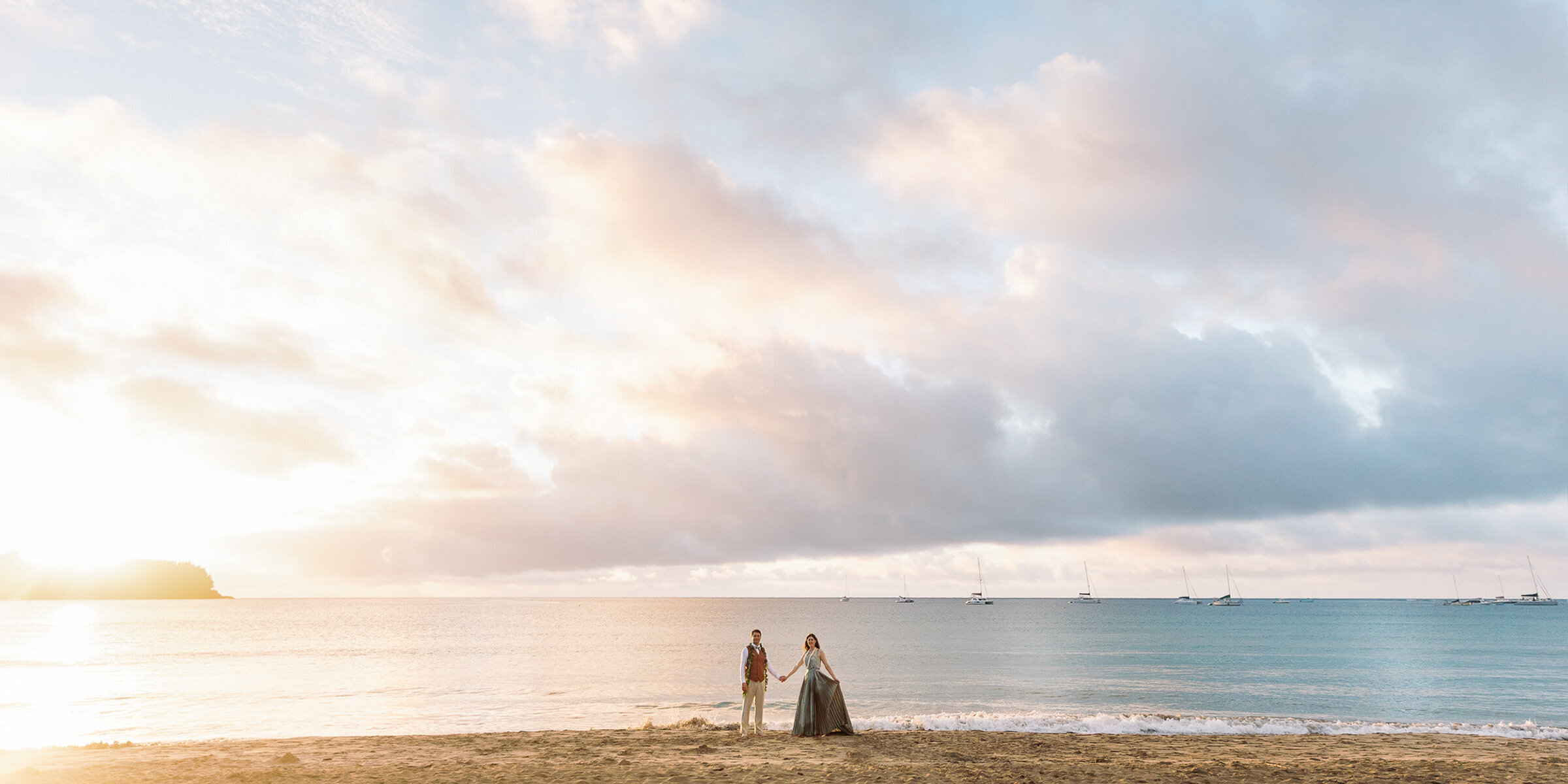 Couple on Hanalei Bay after wedding.