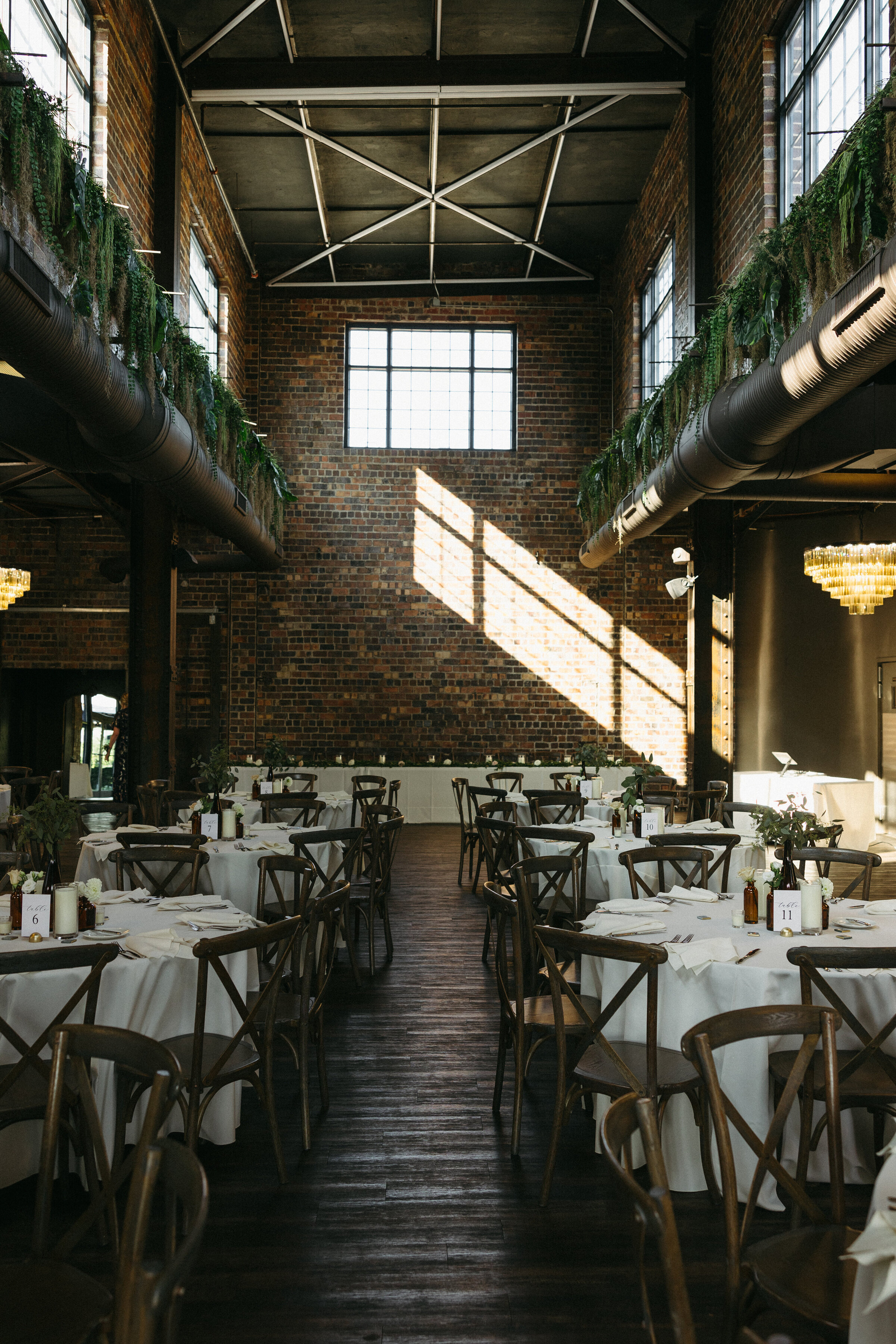 Showcase the charm of your Columbus, OH wedding with a stylish reception space in a rustic brick venue. Perfect for creating an unforgettable atmosphere with modern elegance and timeless appeal.