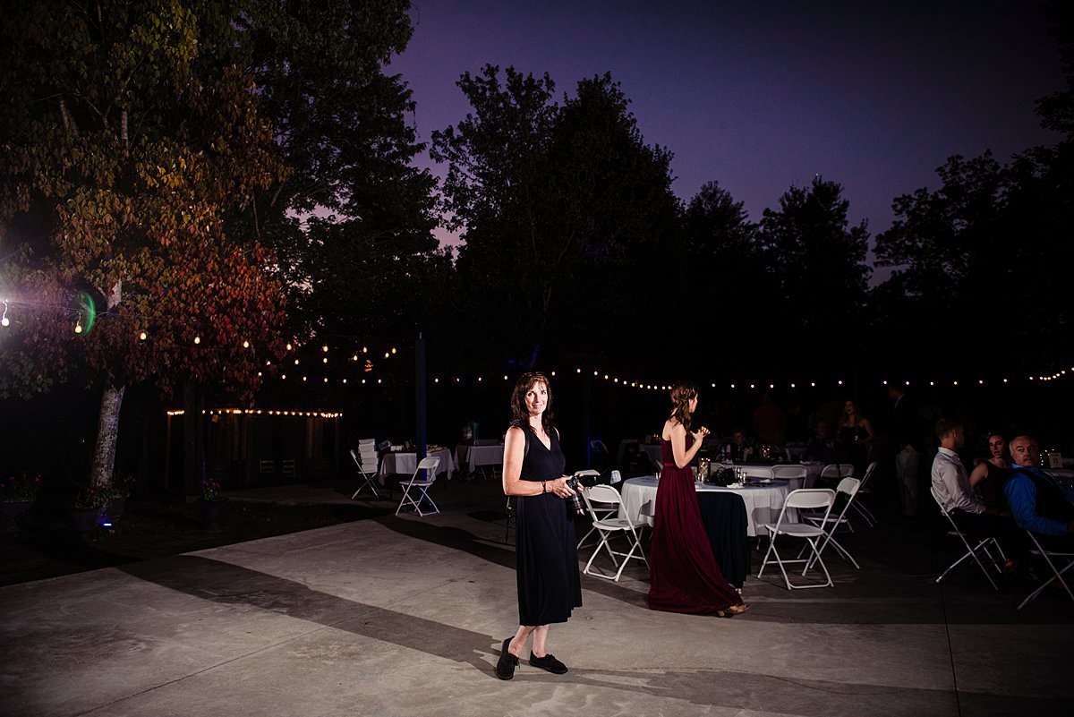 Wedding photographer test photo of lighting on dance floor during sunset on the outdoor patio
