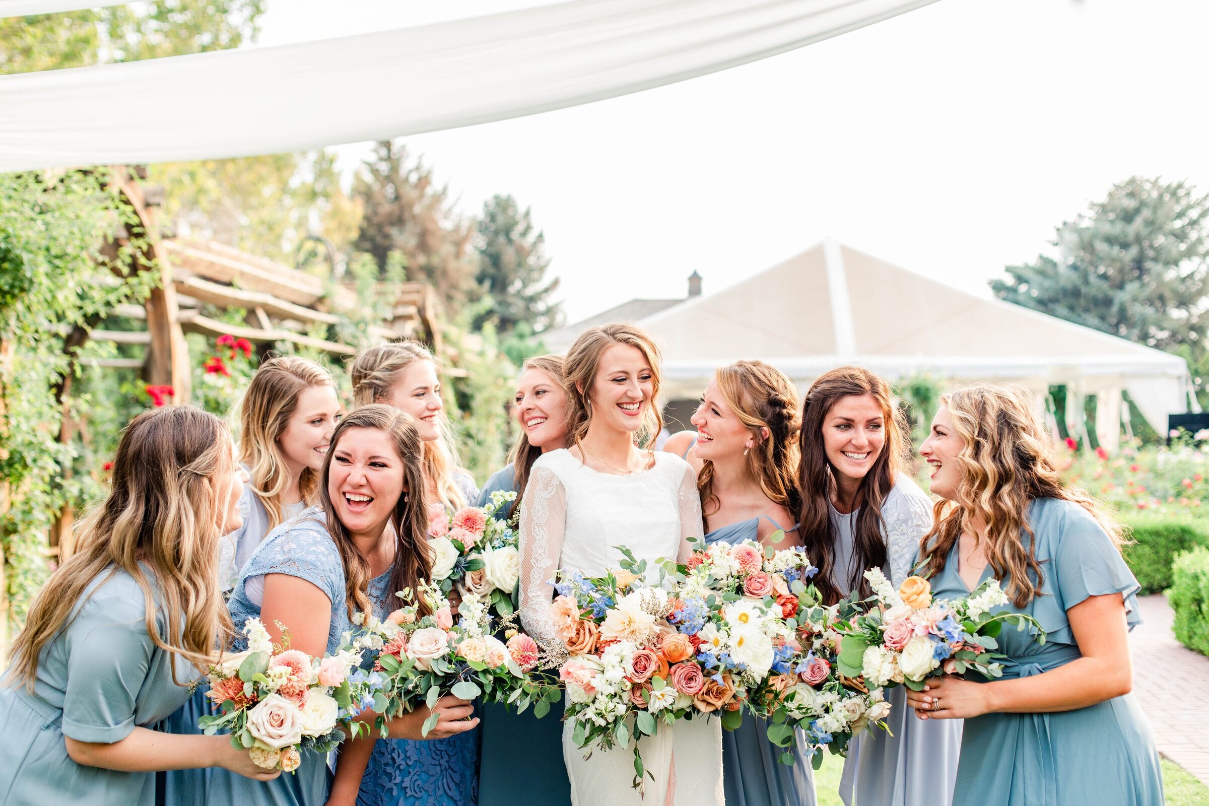 bride and bridesmaids in baby blue