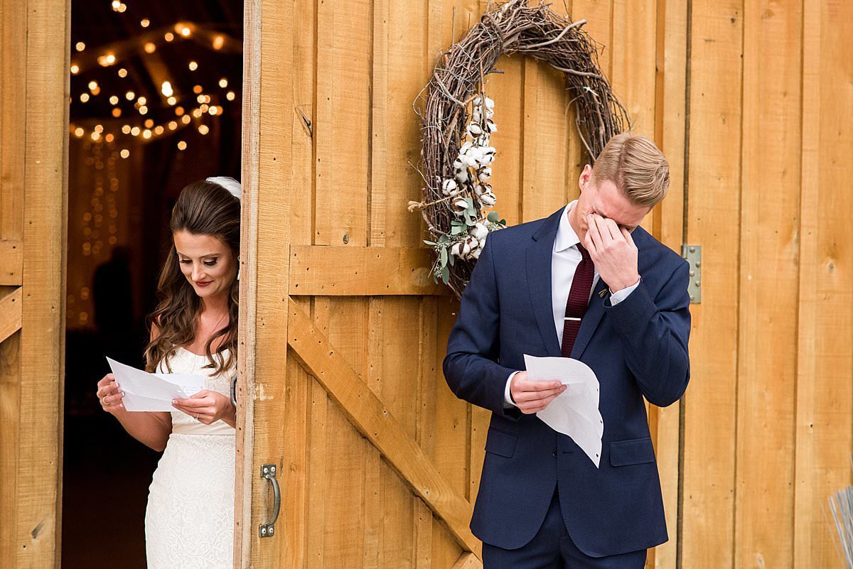 Groom crying during letter exchange before first look at Grace Valley Farm