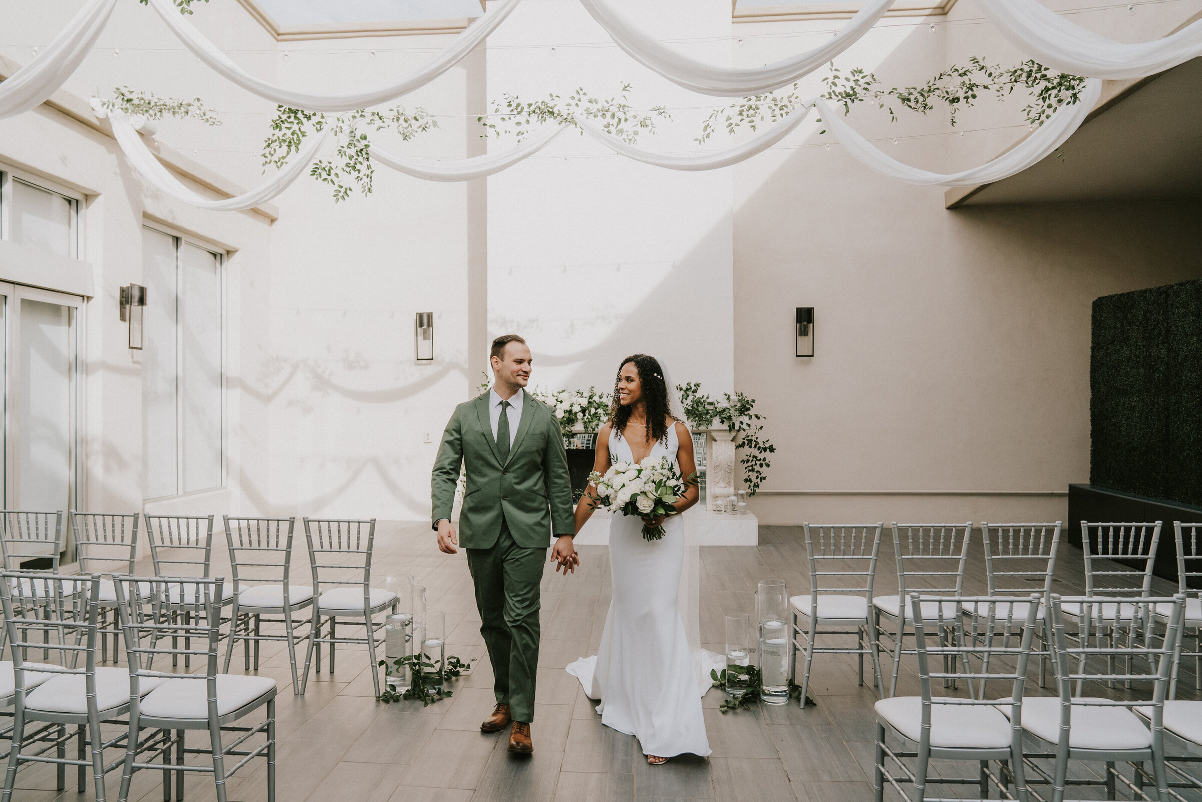 soho63-chandler-wedding-venue-bride-and-groom-outdoor-ceremony-greenery-draping