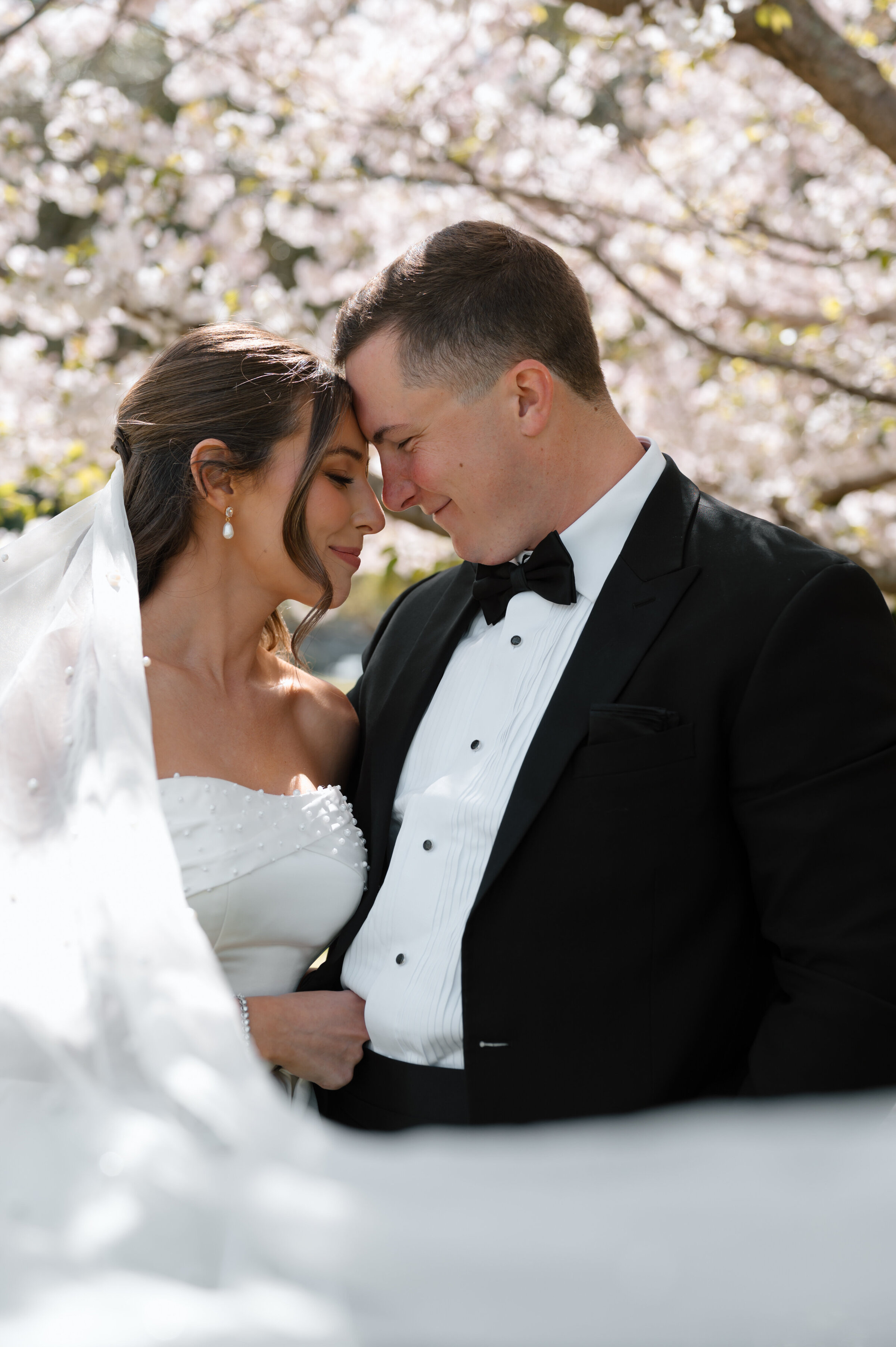 Bridal portraits with veil flowing in Jacksonville