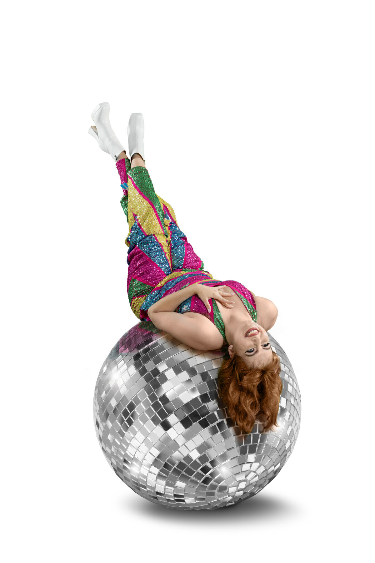 Minnetonka Minnesota high school photo of girl in sequin dress laying on disco ball in a studio