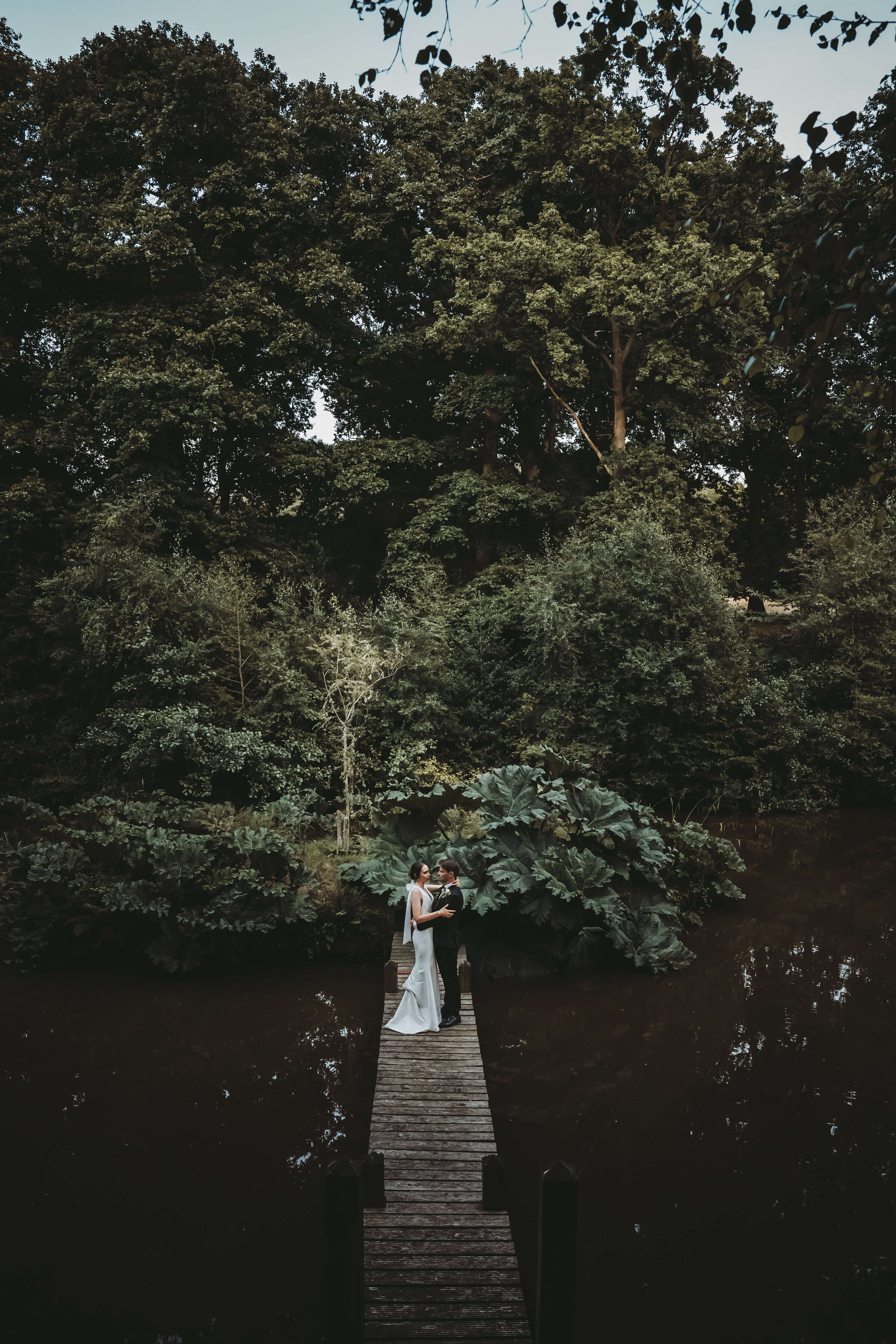 timeless-bridge-lake-wedding-photographer-couple