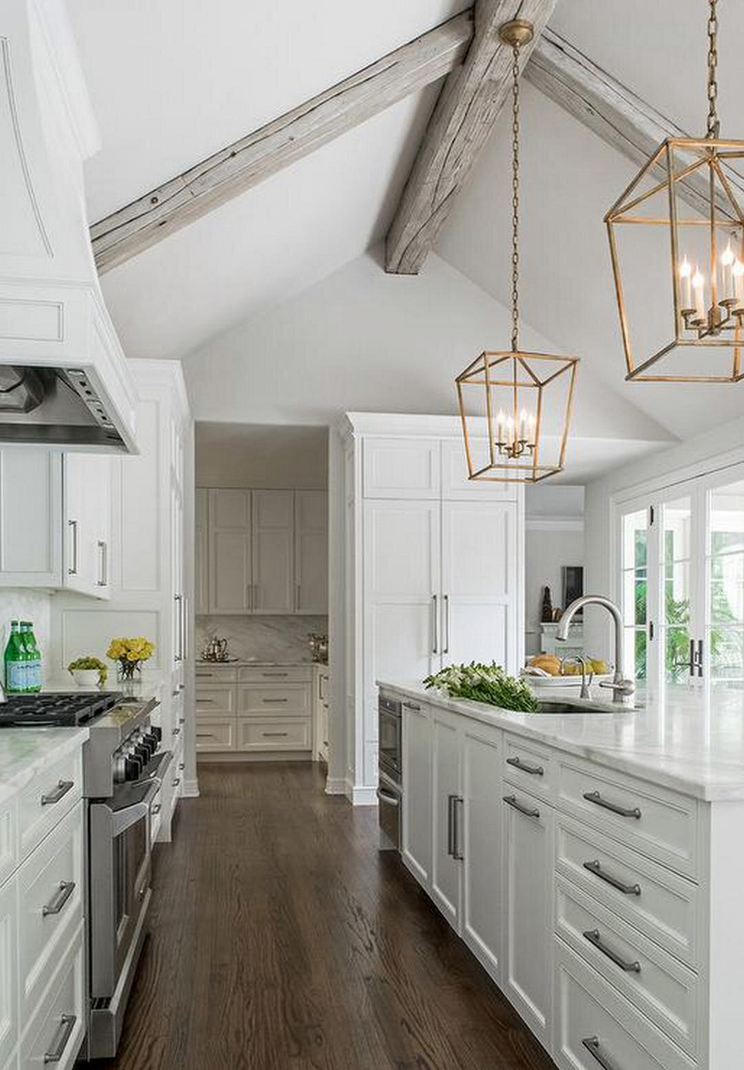 Kitchen design and remodel in Canton, Connecticut with silver hardware and LVT floors