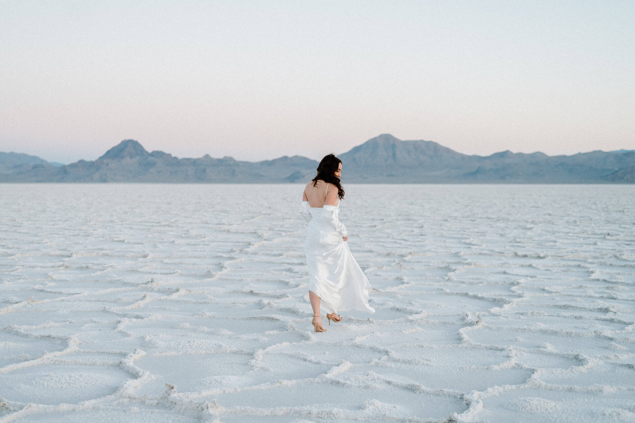 Bride in gown at Utah Salt Flats by Nashville wedding photographers