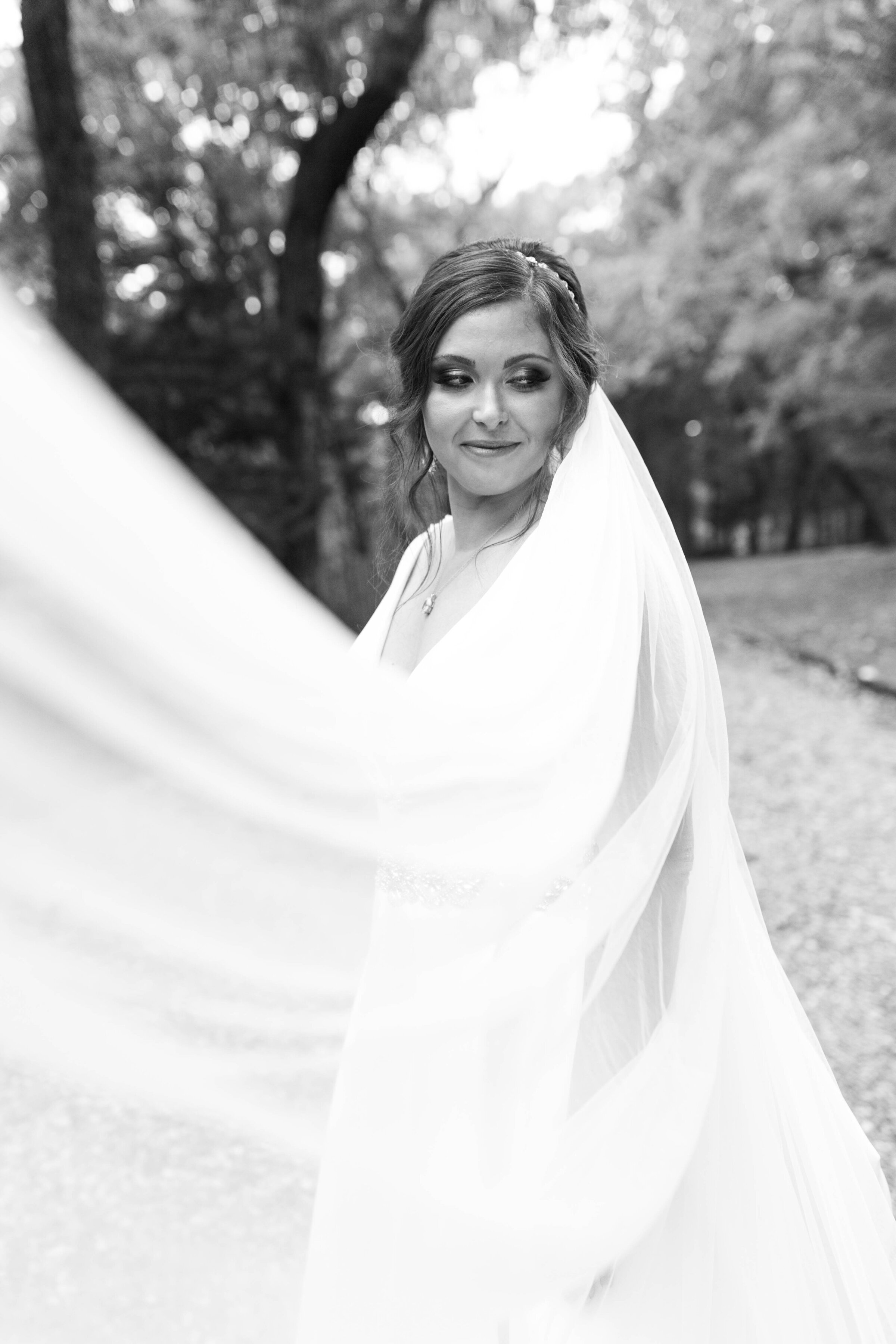 Bride showing off her veil. 
