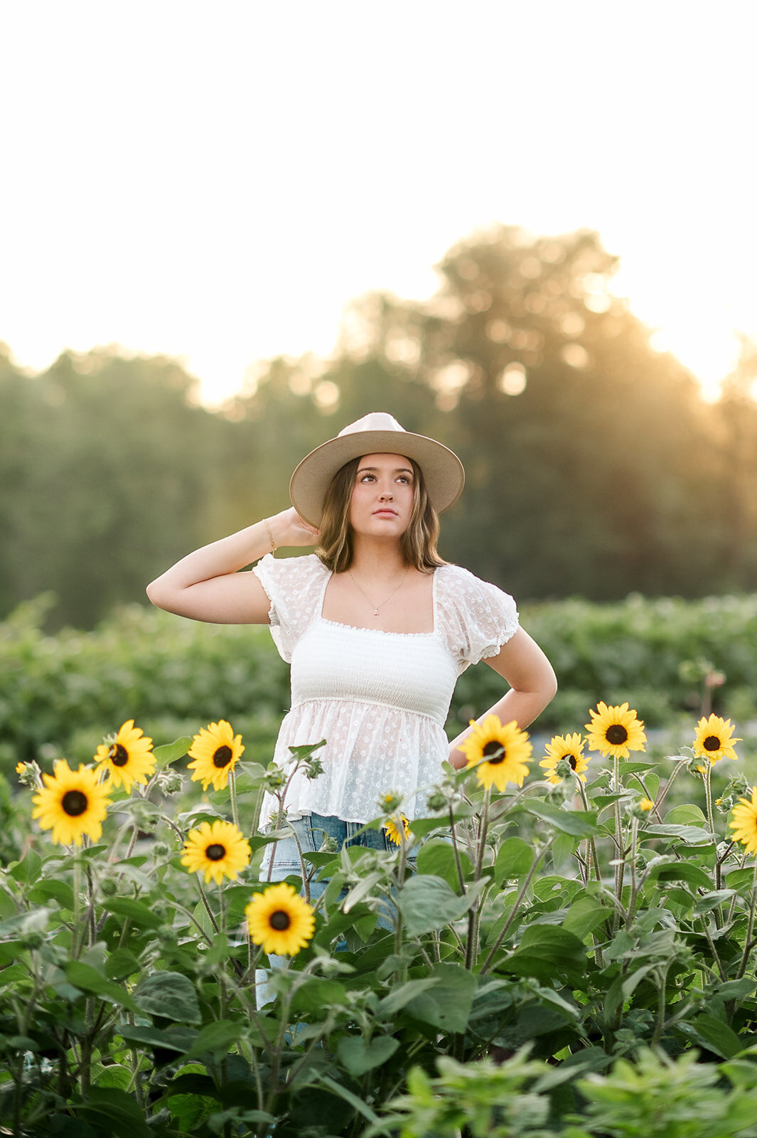 senior-girl-sunflowers-smiling-john-rudy-park.jpg