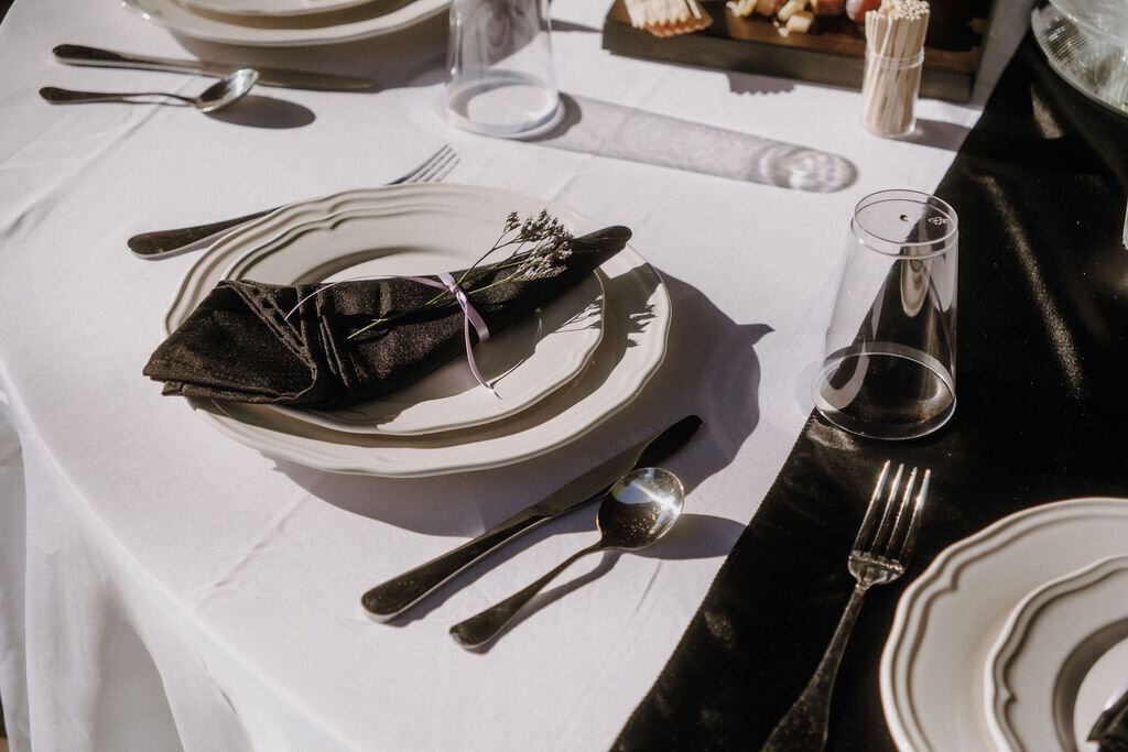 elegant editorial style image of tablescape and table setting at a wedding