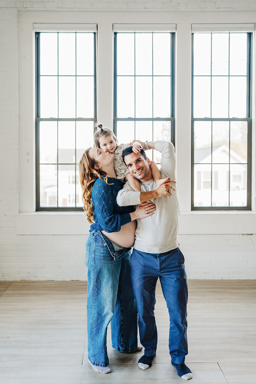 bare belly maternity photos in white studio