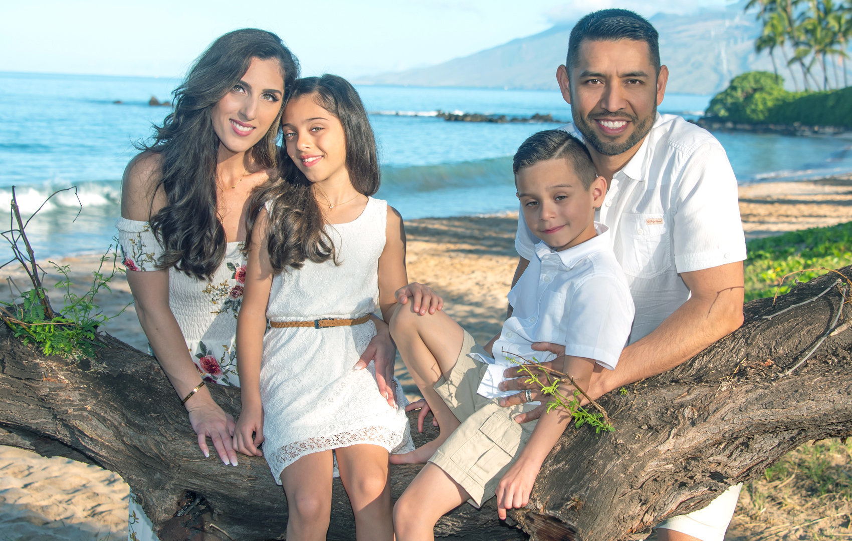 Family portrait with four early risers on south Maui beaches.