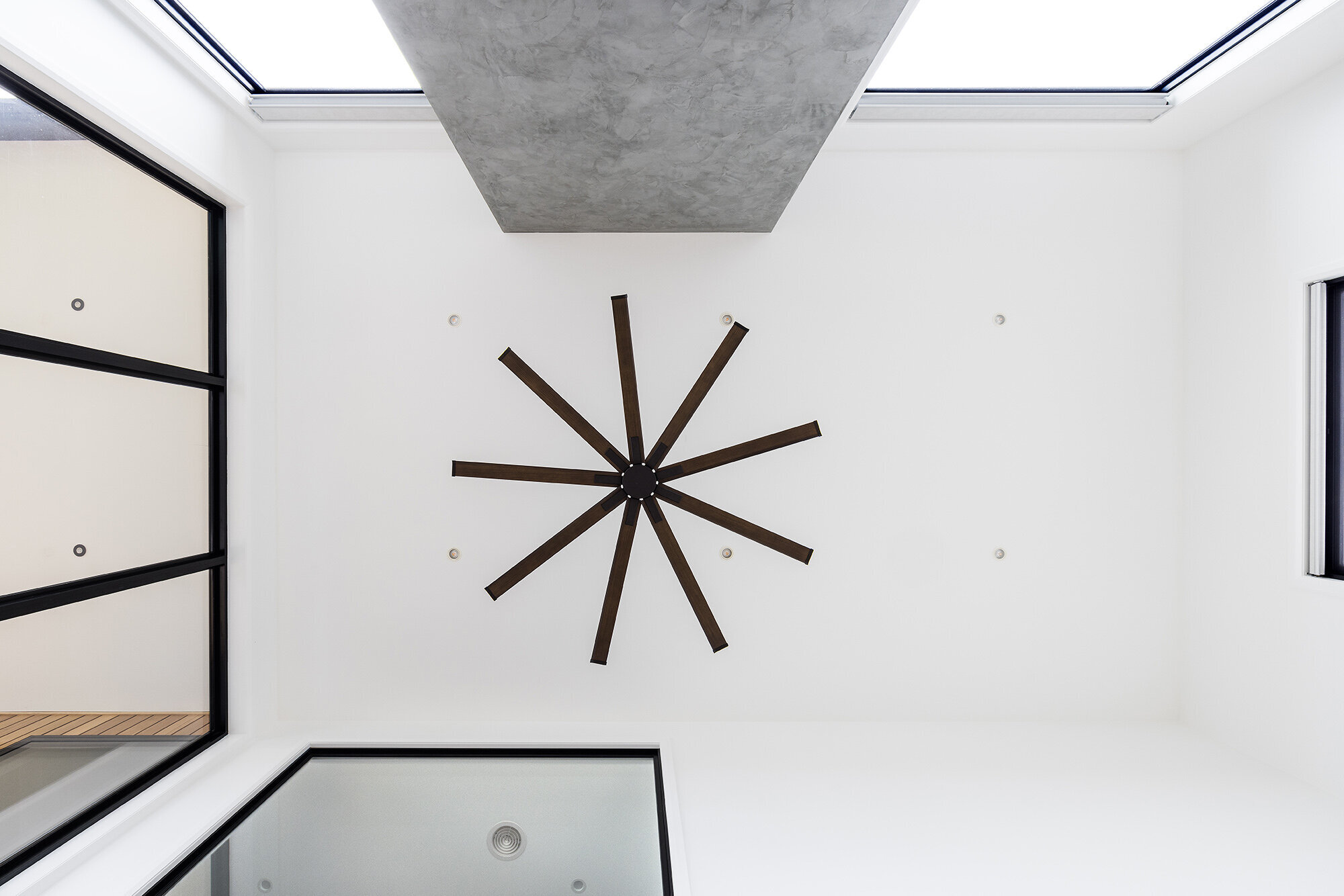 Modern ceiling fan matte black double height ceiling