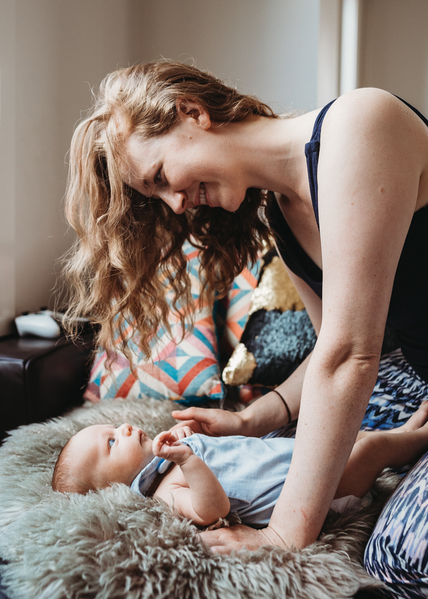 mum-leaning-over-baby-In-Home-Newborn-Photography-Megan Browne-Melbourne-Newborn-Photographer (30)