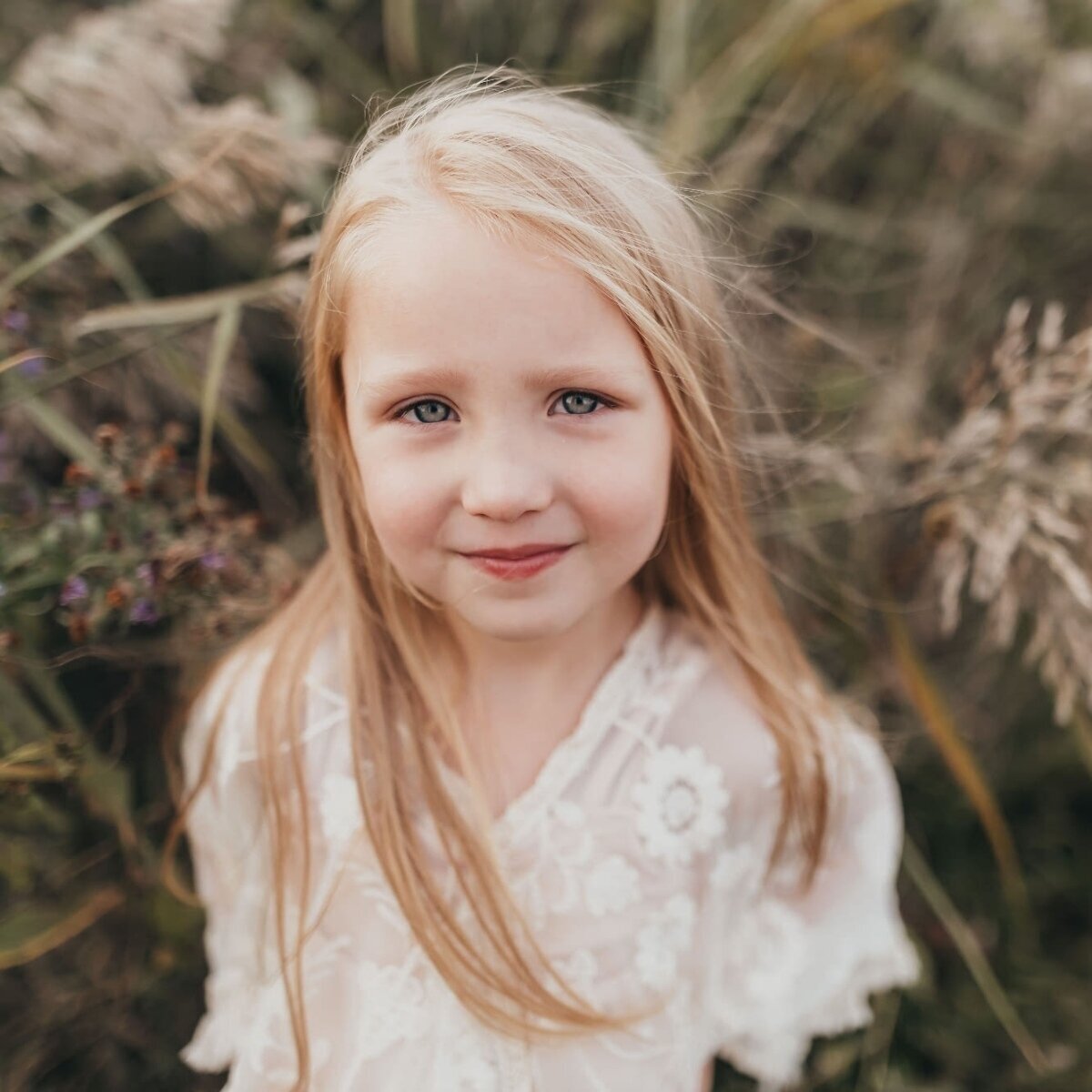 sweet young smiling girl looking at the camera
