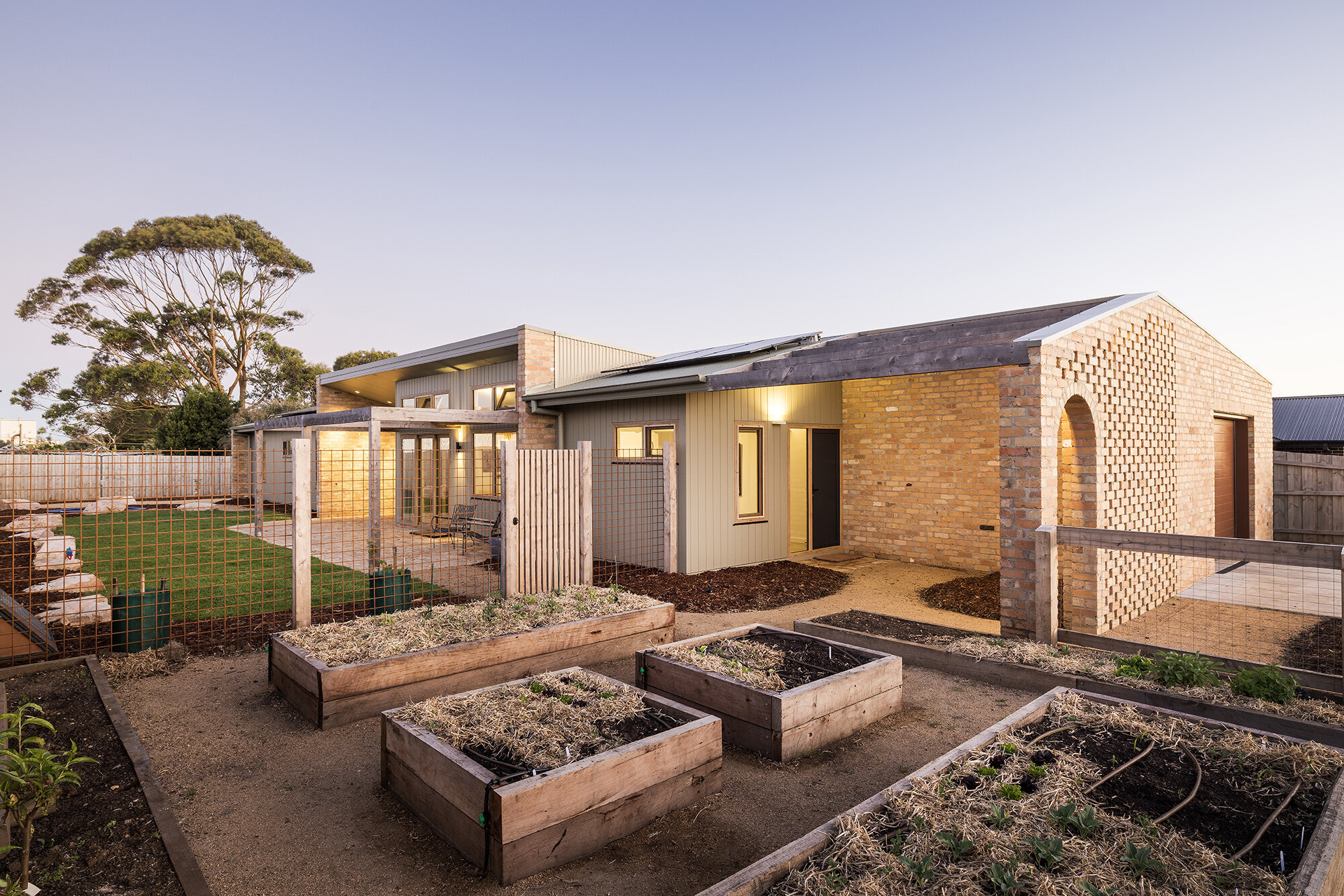 Home exterior brick vegetable garden