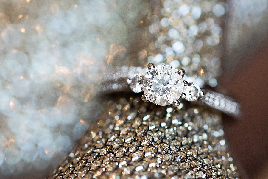 Wedding Ring with Round center diamond and 2 side diamonds