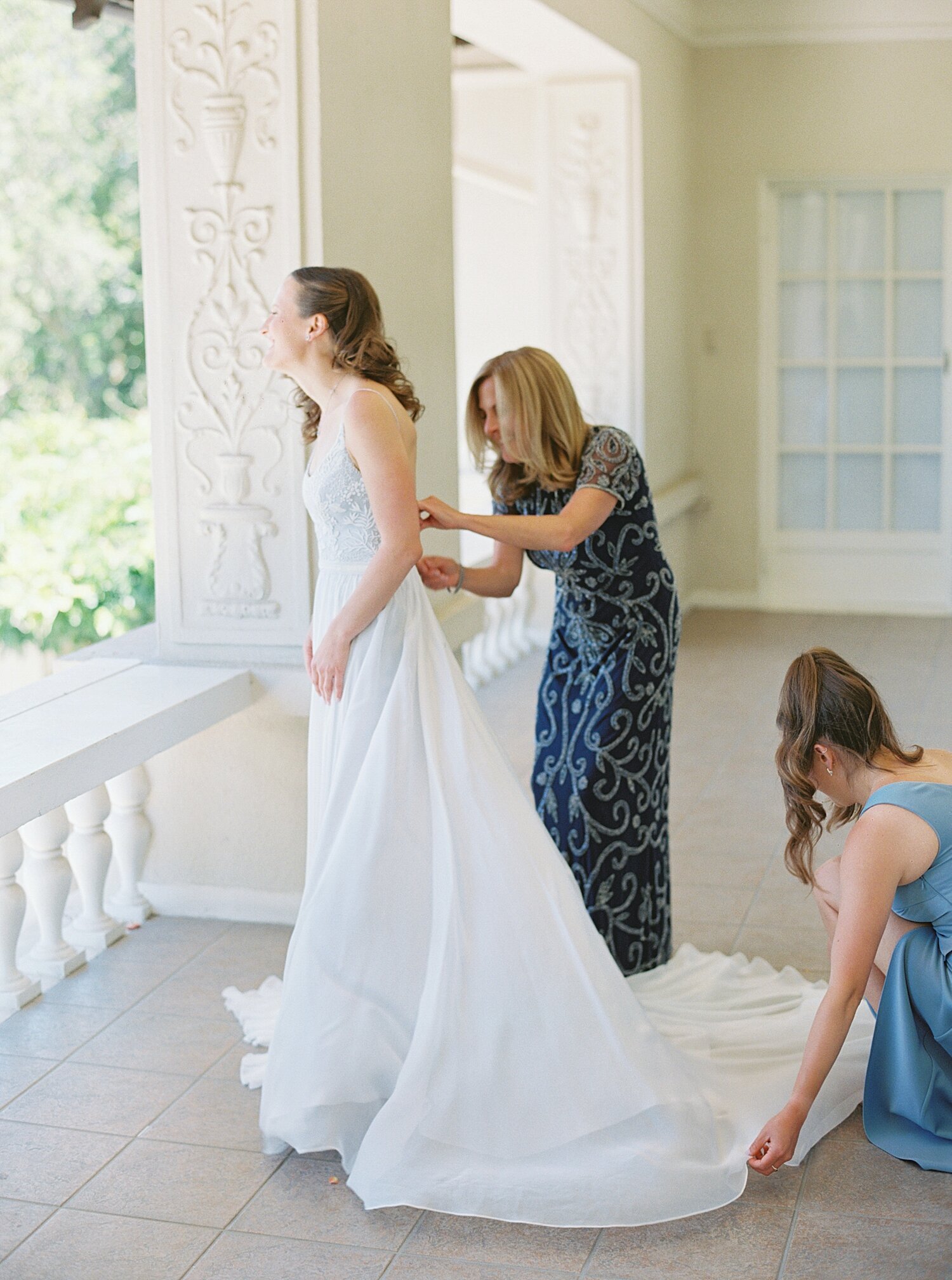 mother of the bride buttons up brides dress