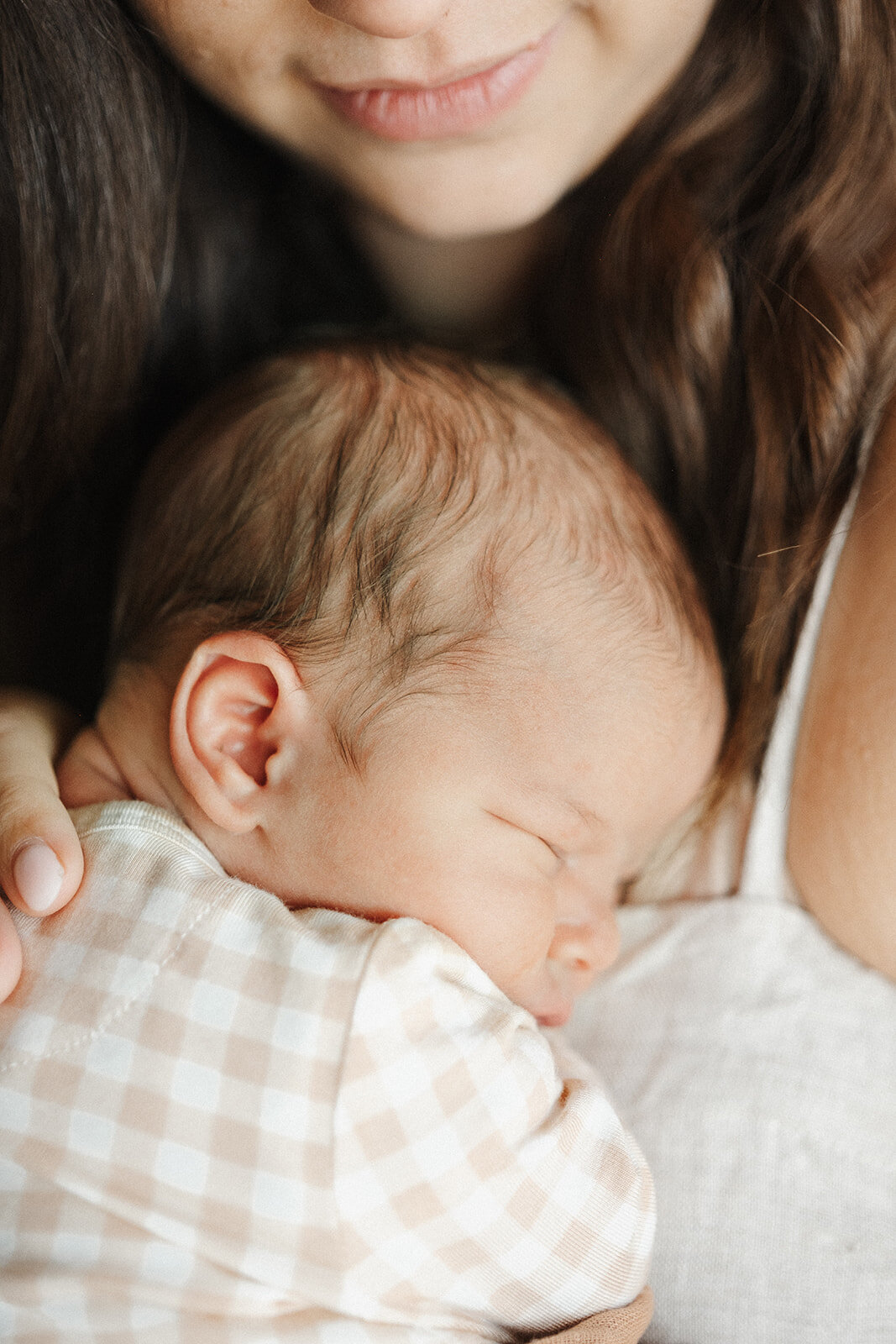 mum holding newborn baby