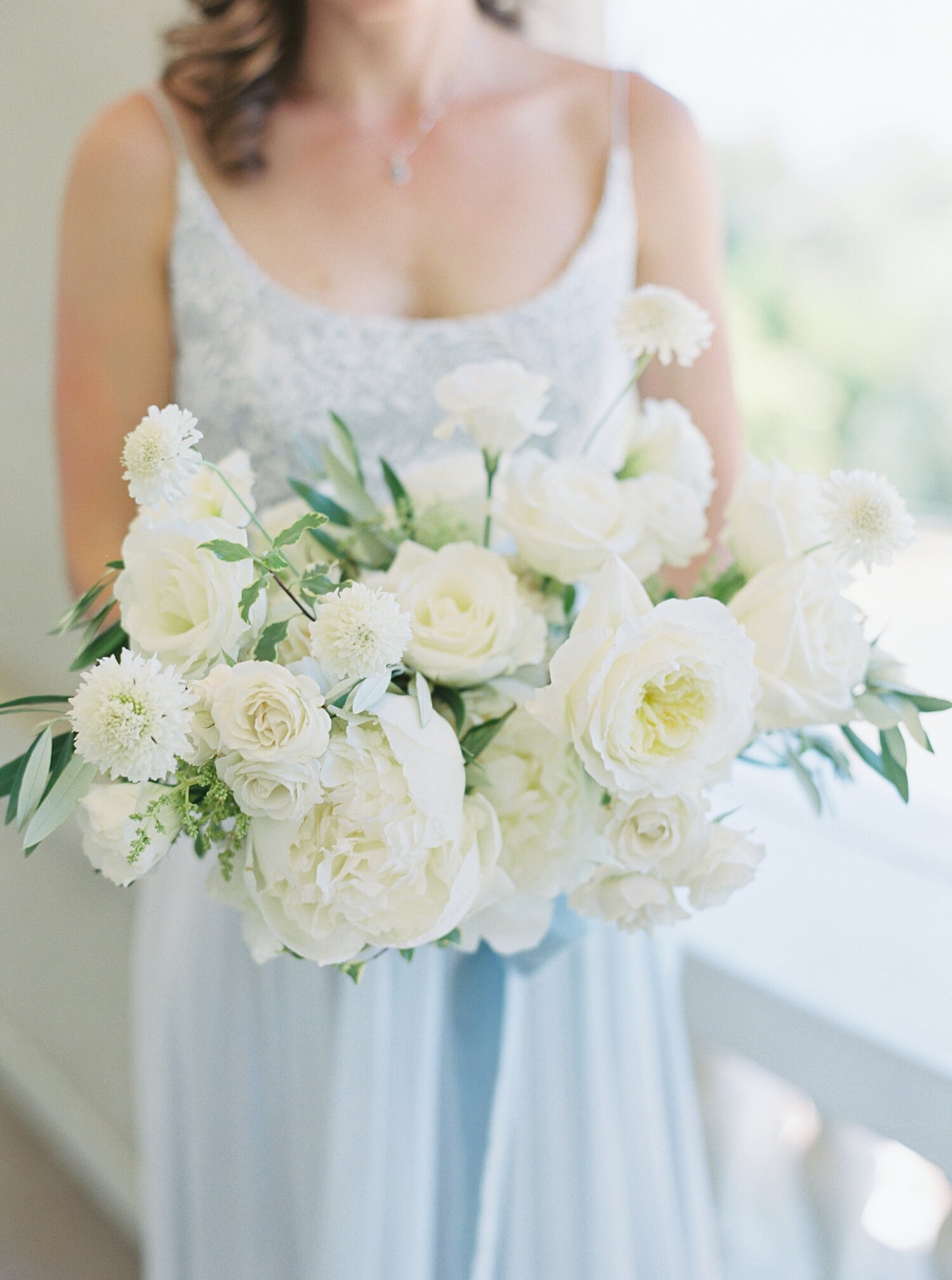 full lush white rose bridal bouquet