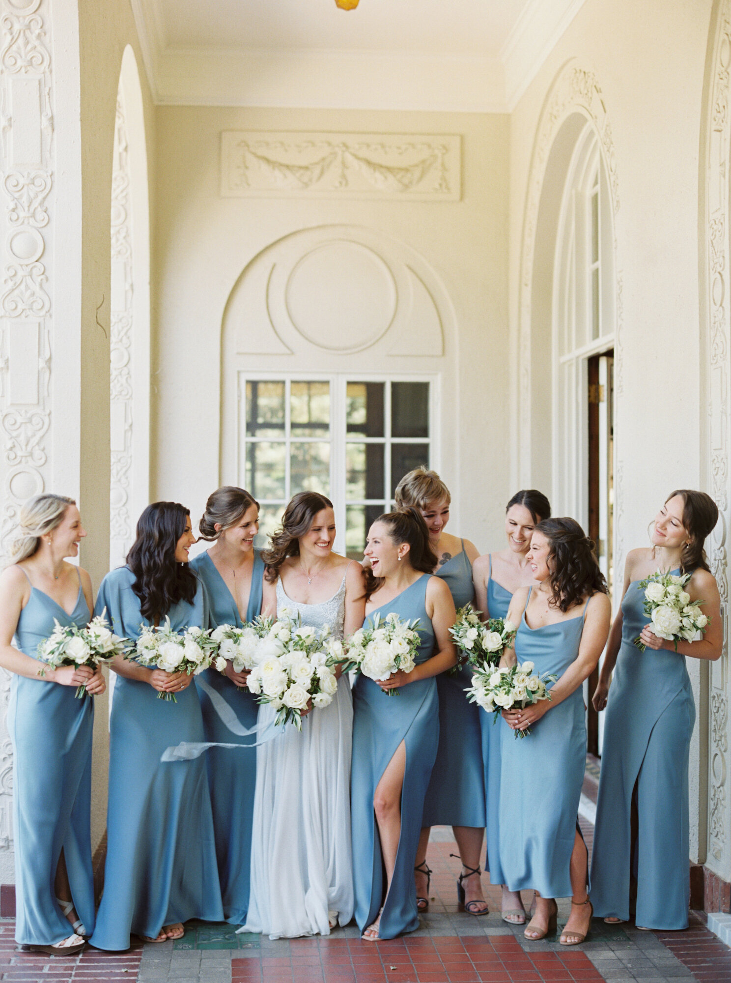 bridesmaids group photo in long silk blue dresses