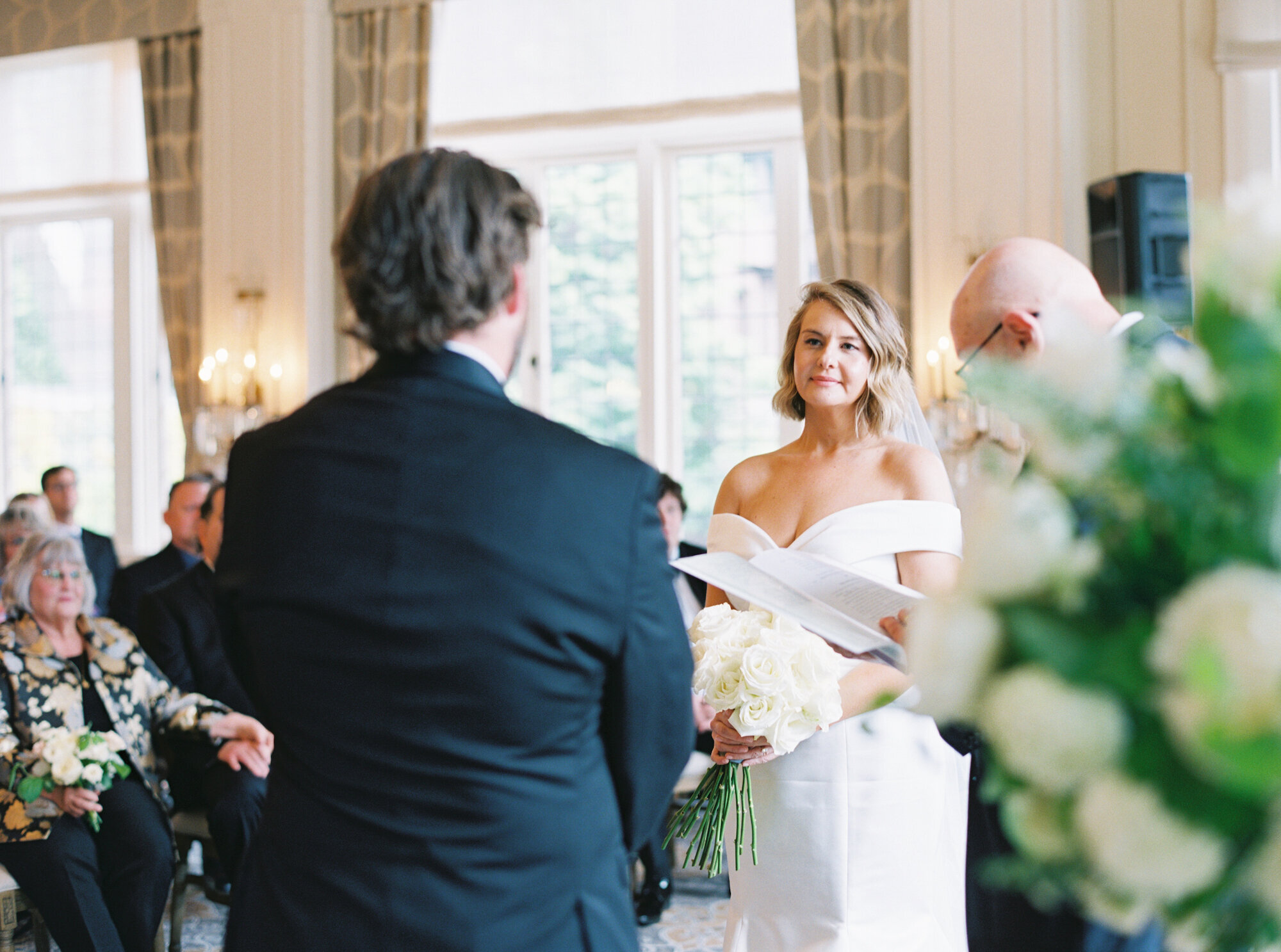 historic seattle wedding venue the rainier club ceremony in the heritage room film photography