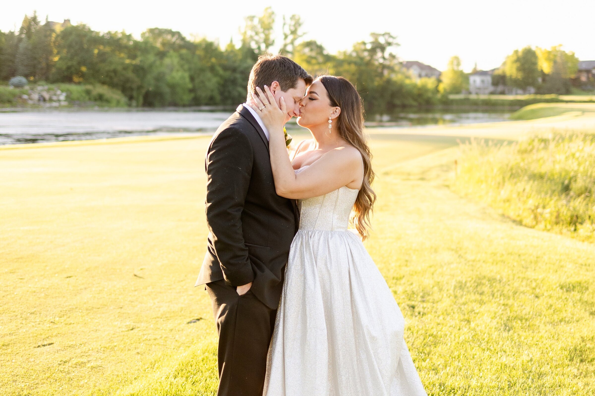 Bride and groom embracing, taken by wedding photographers minneapolis Kacey Wyrick Photography