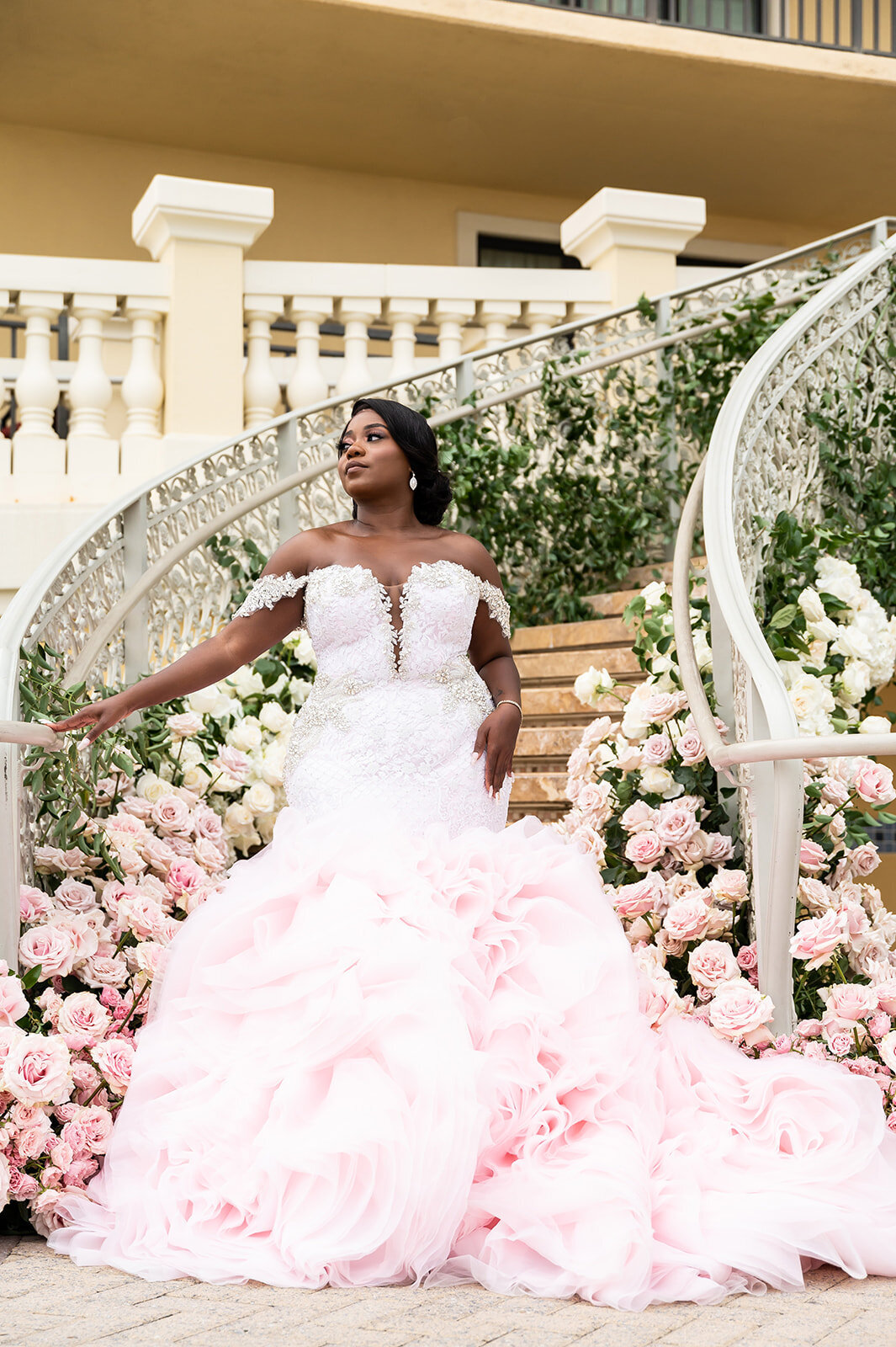 Bride walking down the aisle surrounded by elegant décor and floral artistry in Florida