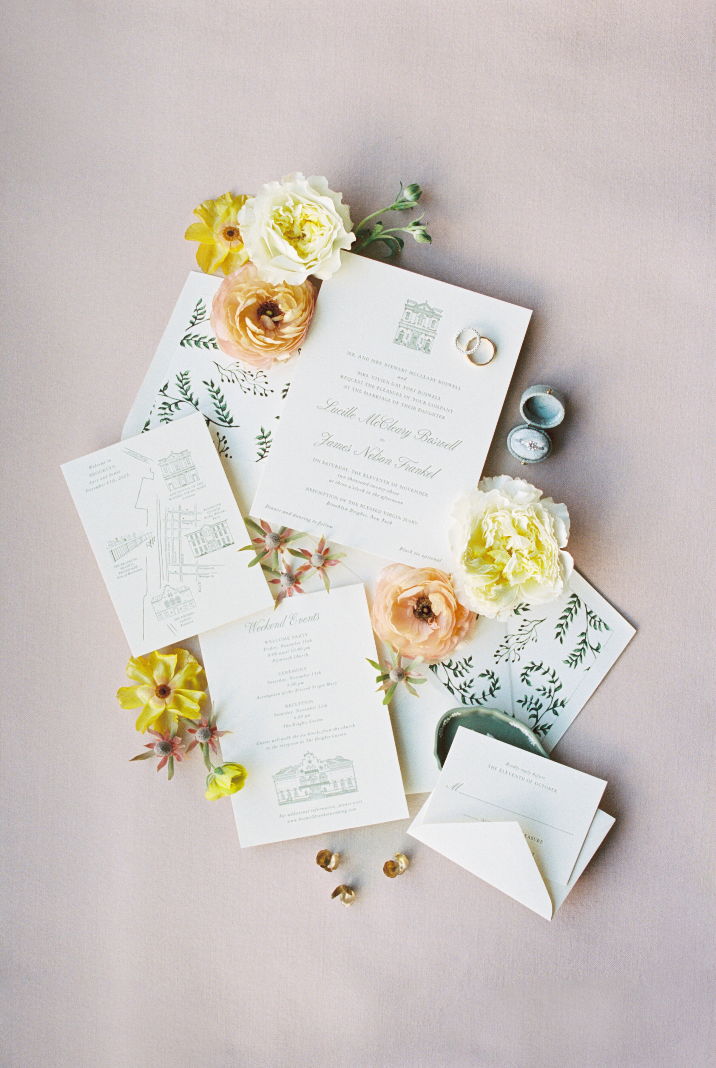 flat lay of custom designed and illustrated invitation suite for wedding in Brooklyn, NY