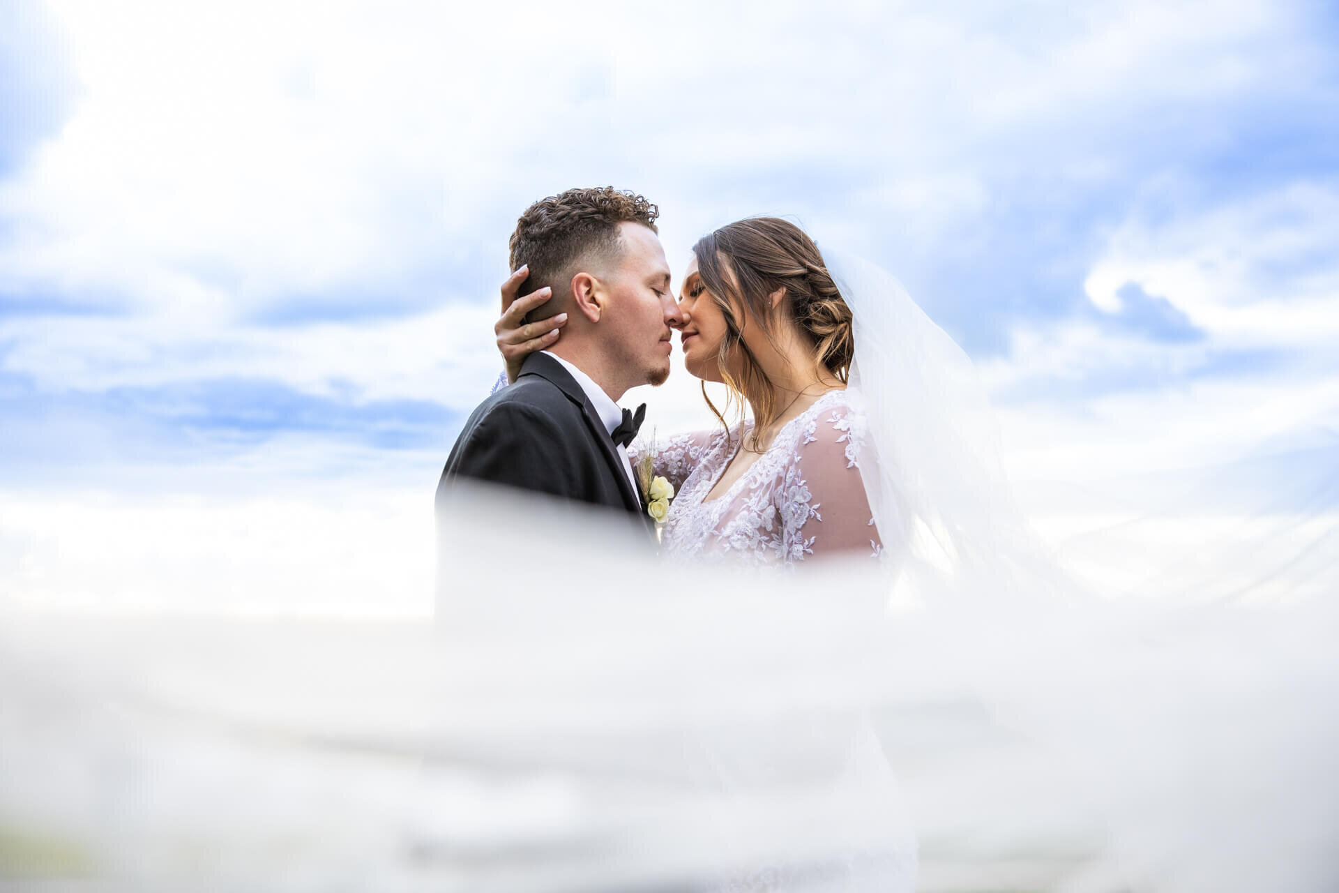 Finger-Lakes-Wedding-Photographer-Seneca-Lake-Logan-Ridge-Veil-Romantic-Kiss