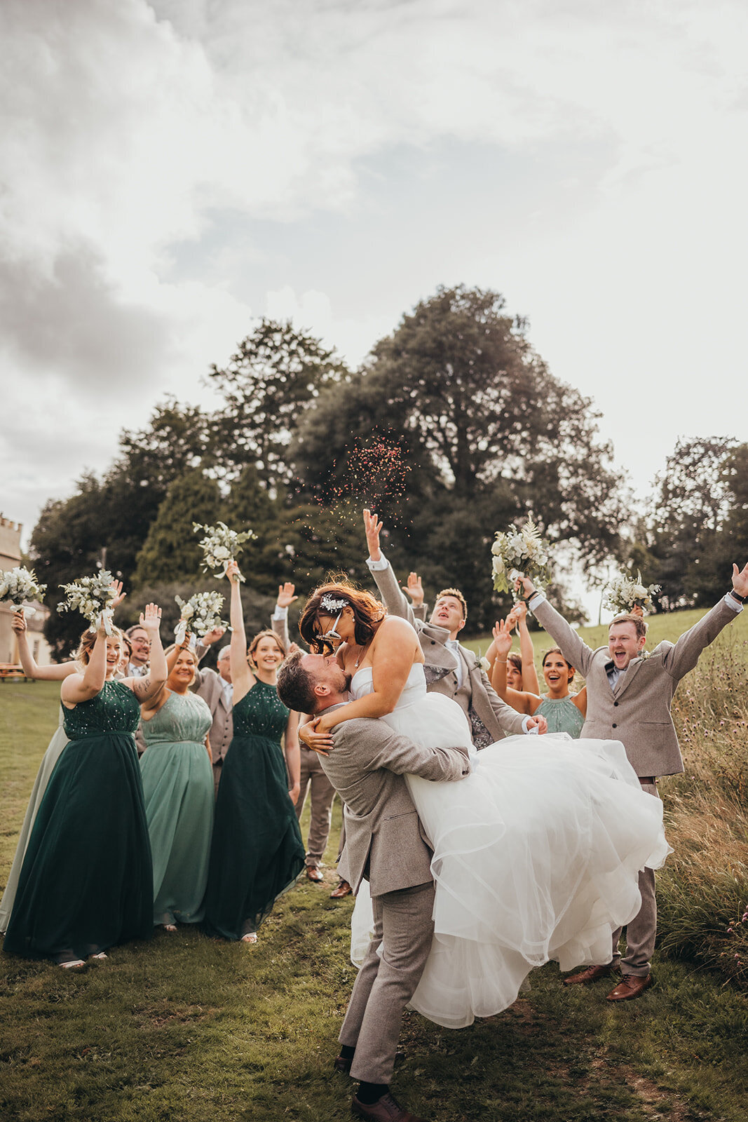 wedding party celebrate with bride and groom