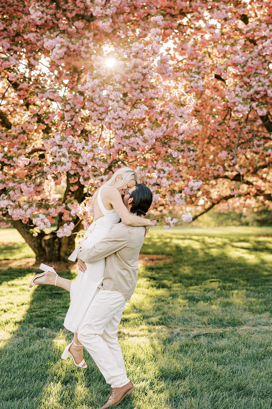 Longwood-gardens-cherry-blossom-engagement-photo