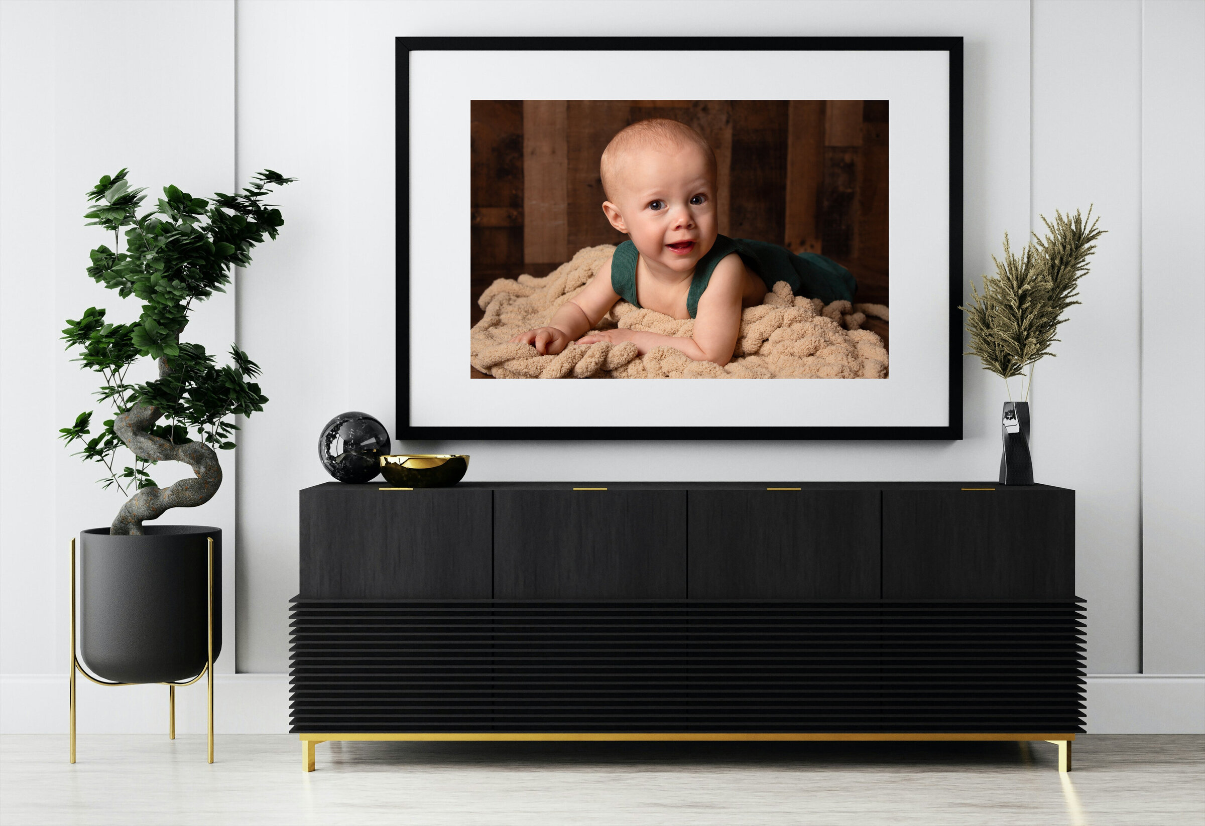 Living room wall with a large piece of wall art.