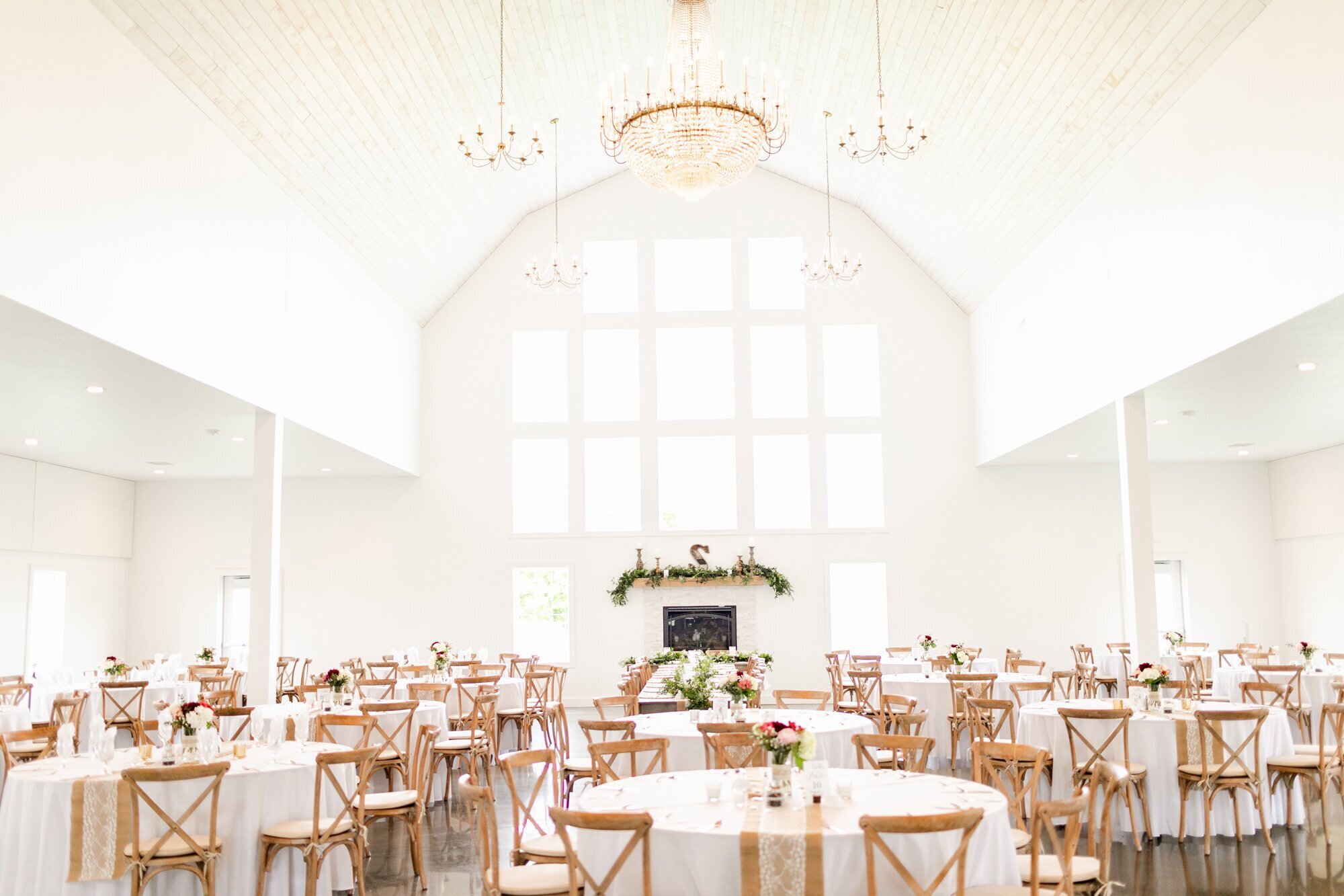 reception set up with tables and flowers, taken by wedding photographer minneapolis mn
