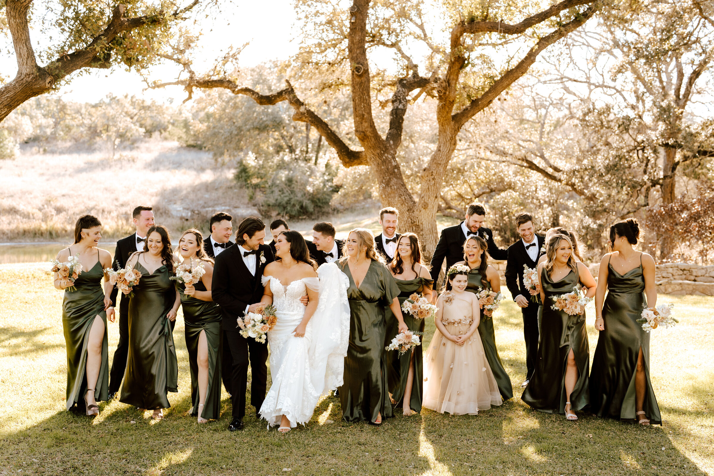 High Pointe Estate wedding. Liberty Hill Texas. Large wedding party photo.  Indian Wedding. Maroon bridesmaid dresses. Fall wedding colors. Black tie wedding photographer.  North Austin.