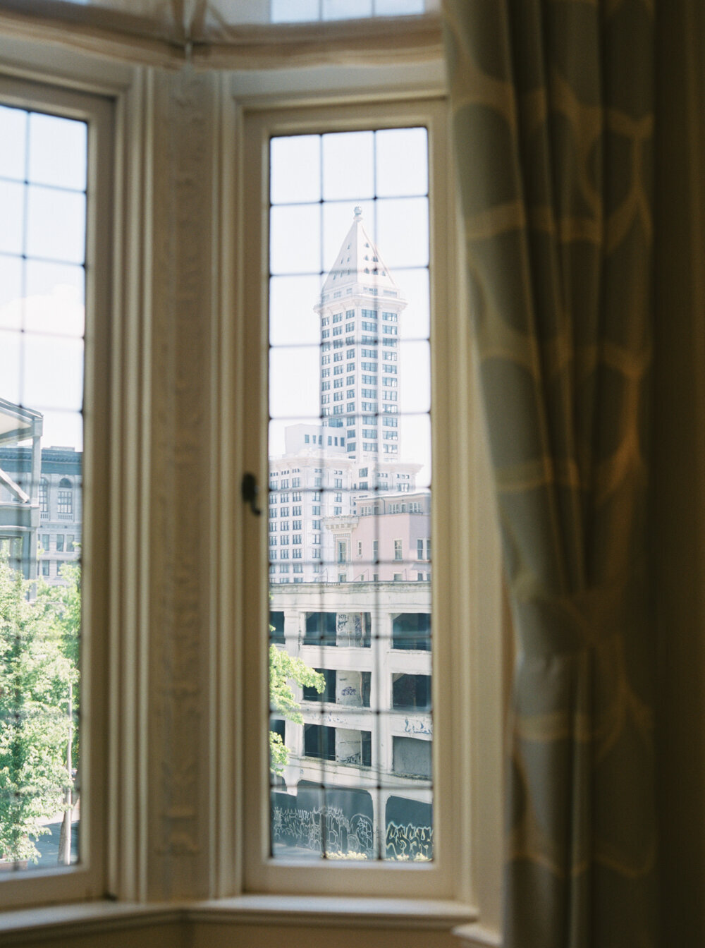 view of the Smith Tower in Seattle from the window of the heritage room at the rainier club