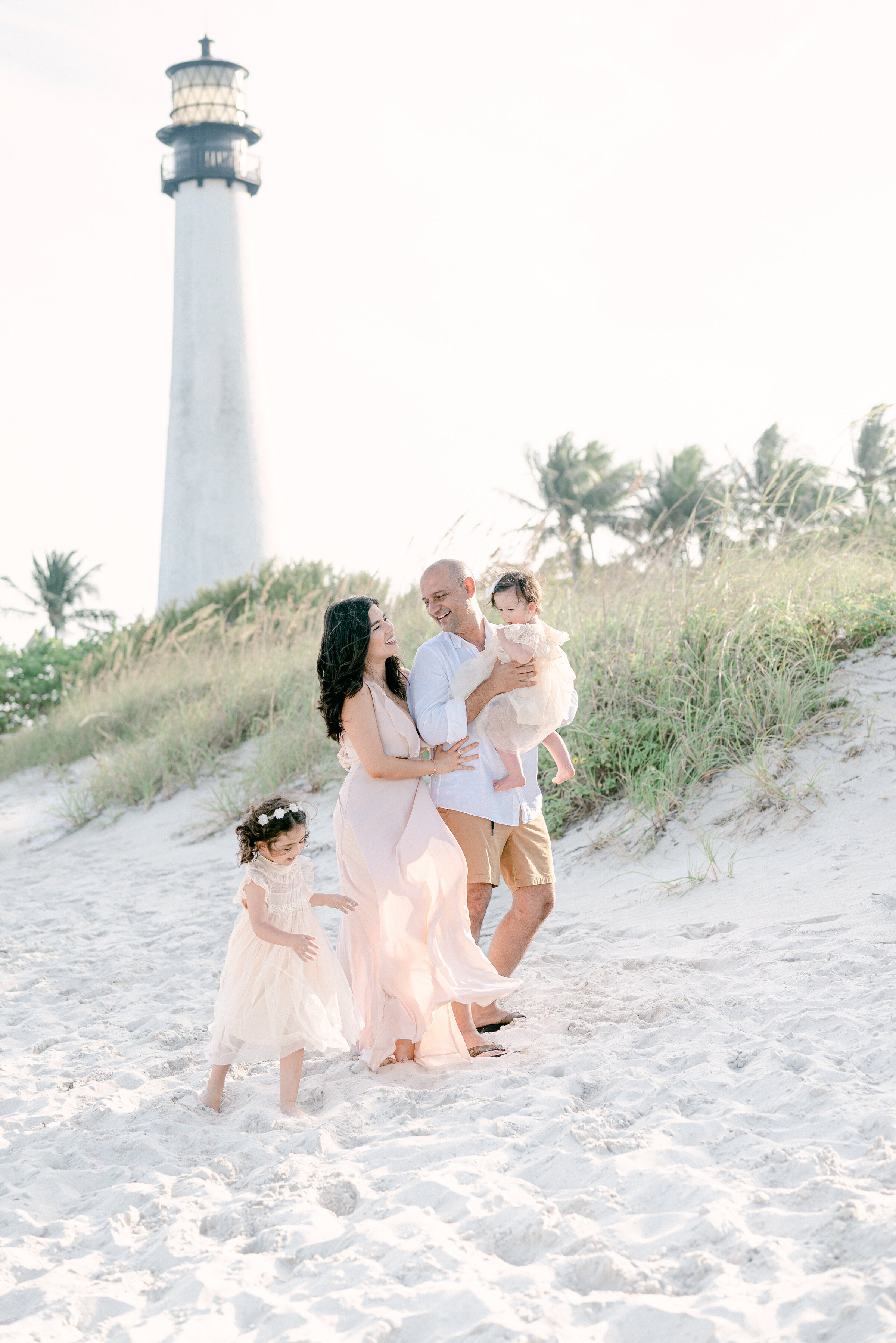 family of 4 playing in key biscayne beach
