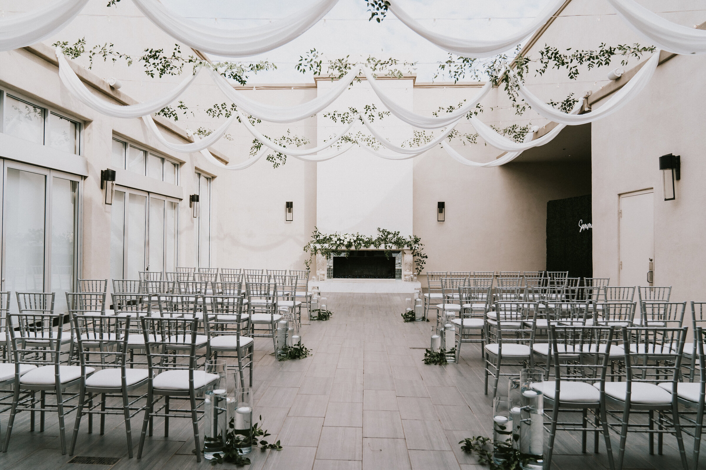 soho63-wedding-venue-ceremony-greenery-modern-draping