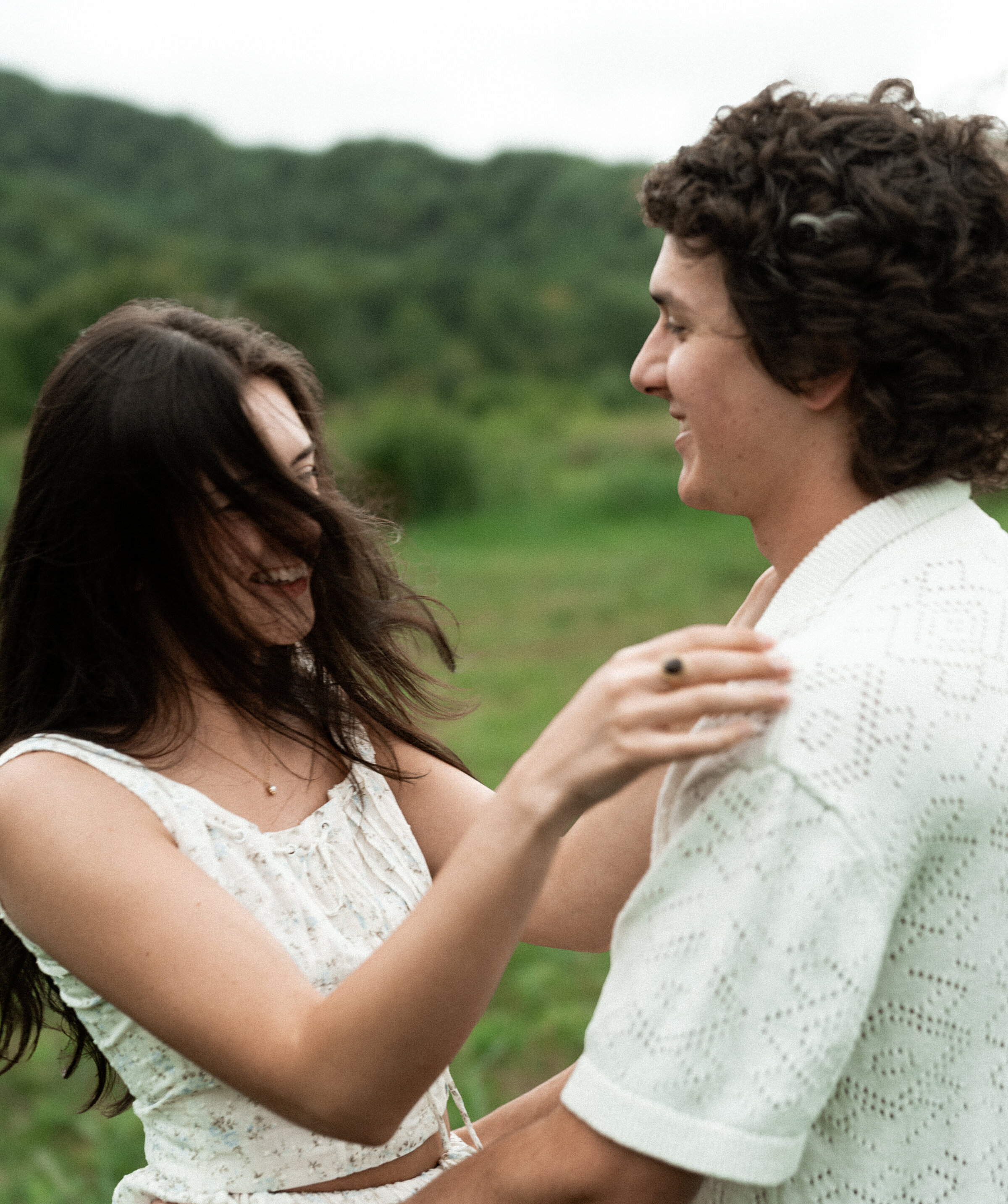 couple photos session dancing and laughing