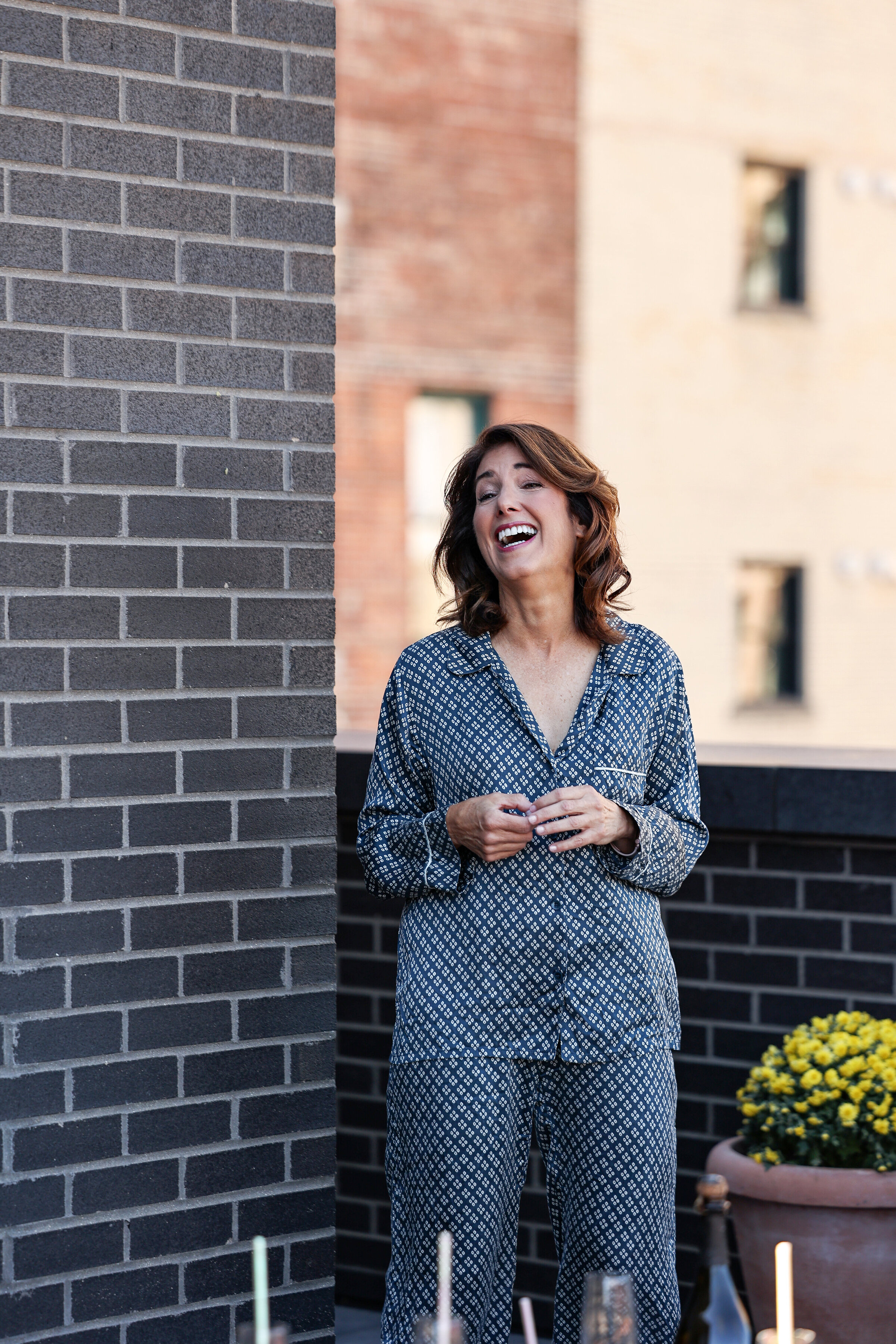 Mother of the grrom enjoying rooftop at Shinola Hotel in Detroit mi