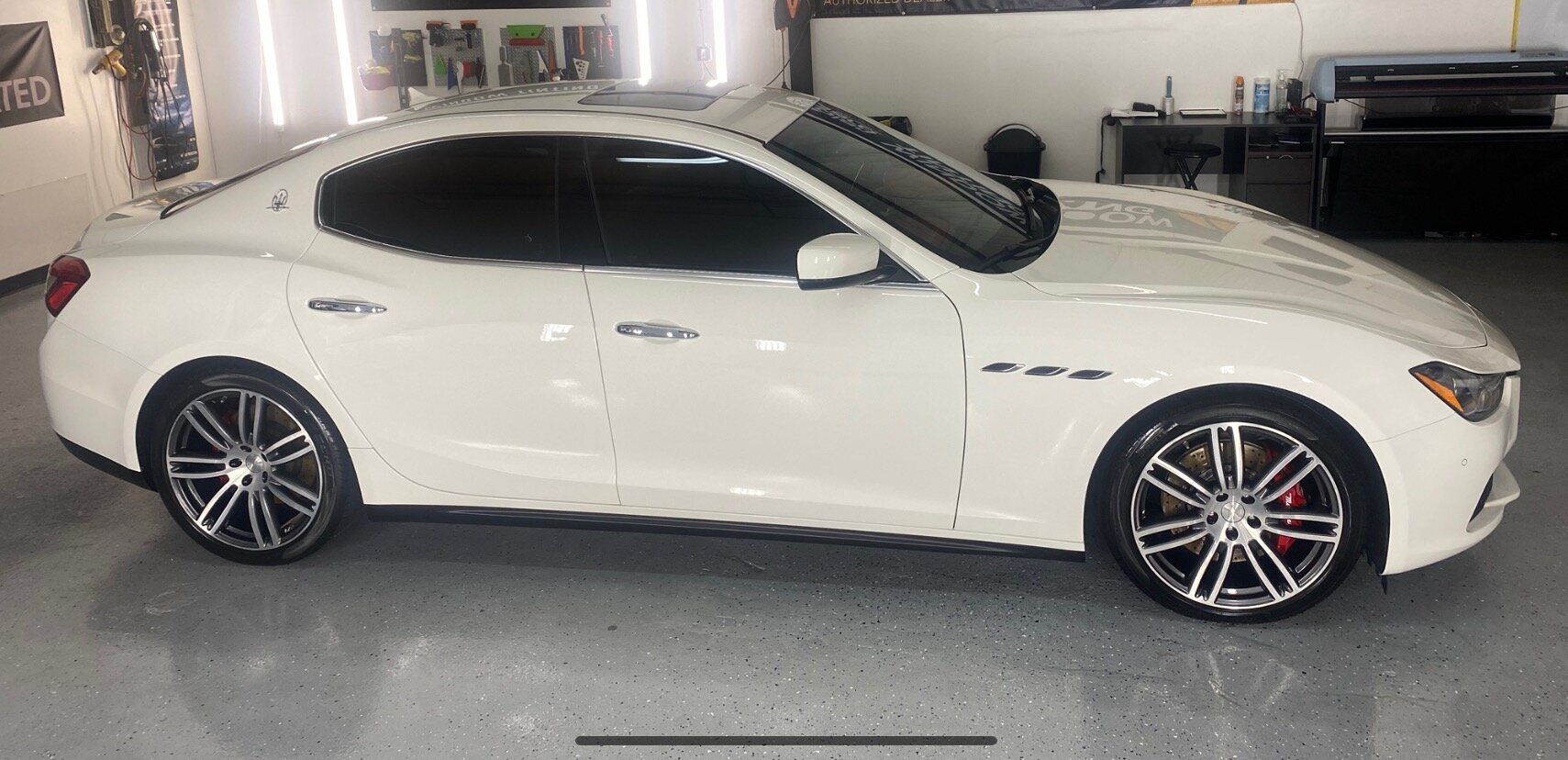 https://static.showit.co/2400/xeZG4b7eQemX3GmNj-JHgA/shared/a-nice-touch-auto-detailing-white-car-scratch-scuff-paint-transfer-removal.jpg
