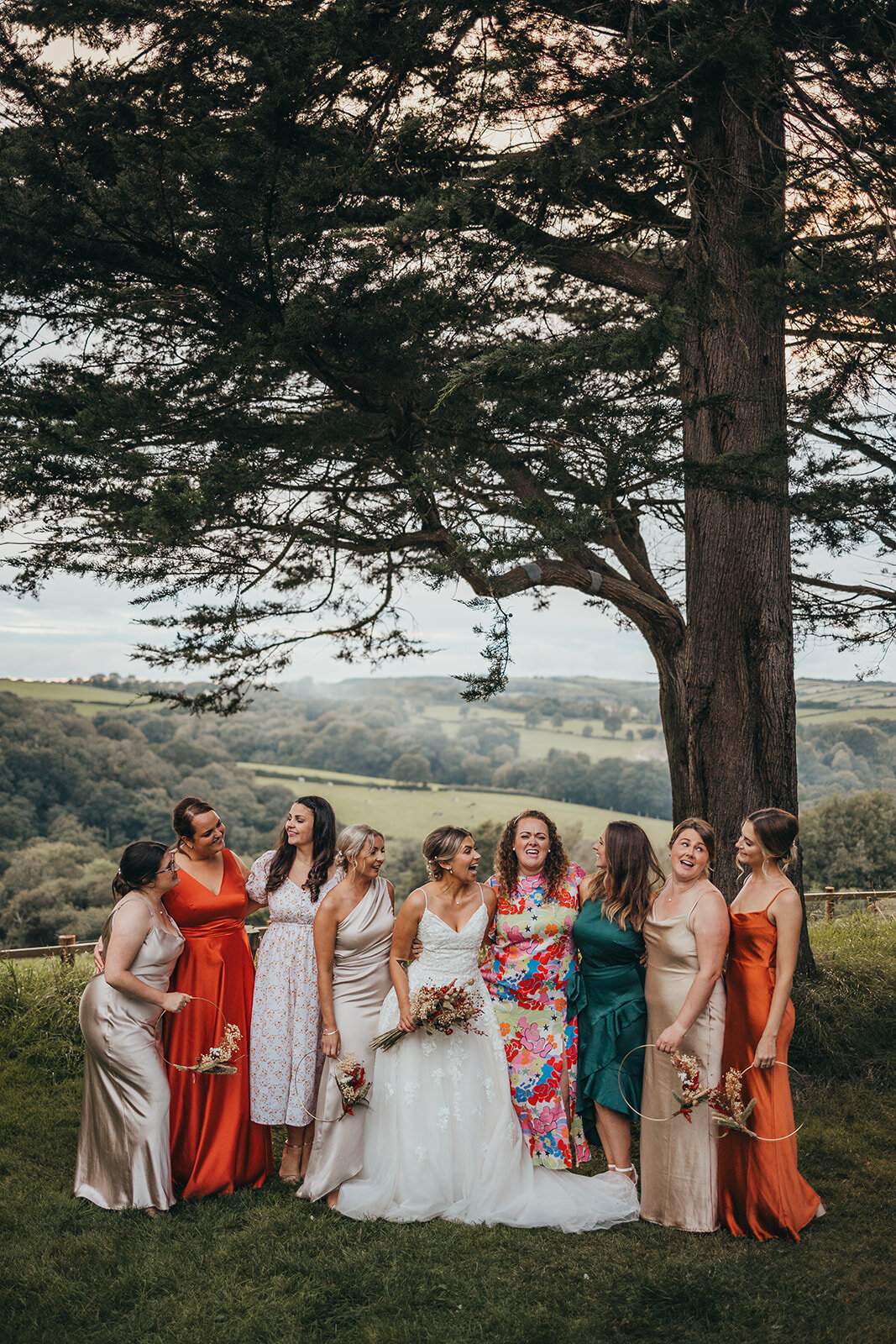 bride and her friends pose for a photo