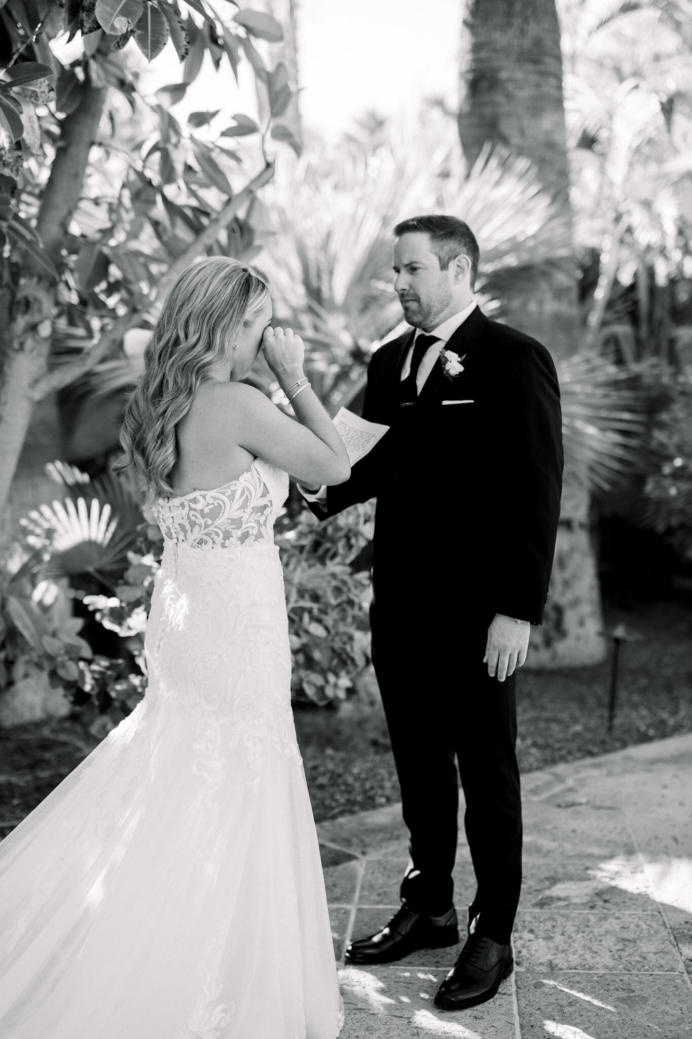 Black and white of bride and groom at a first look. 