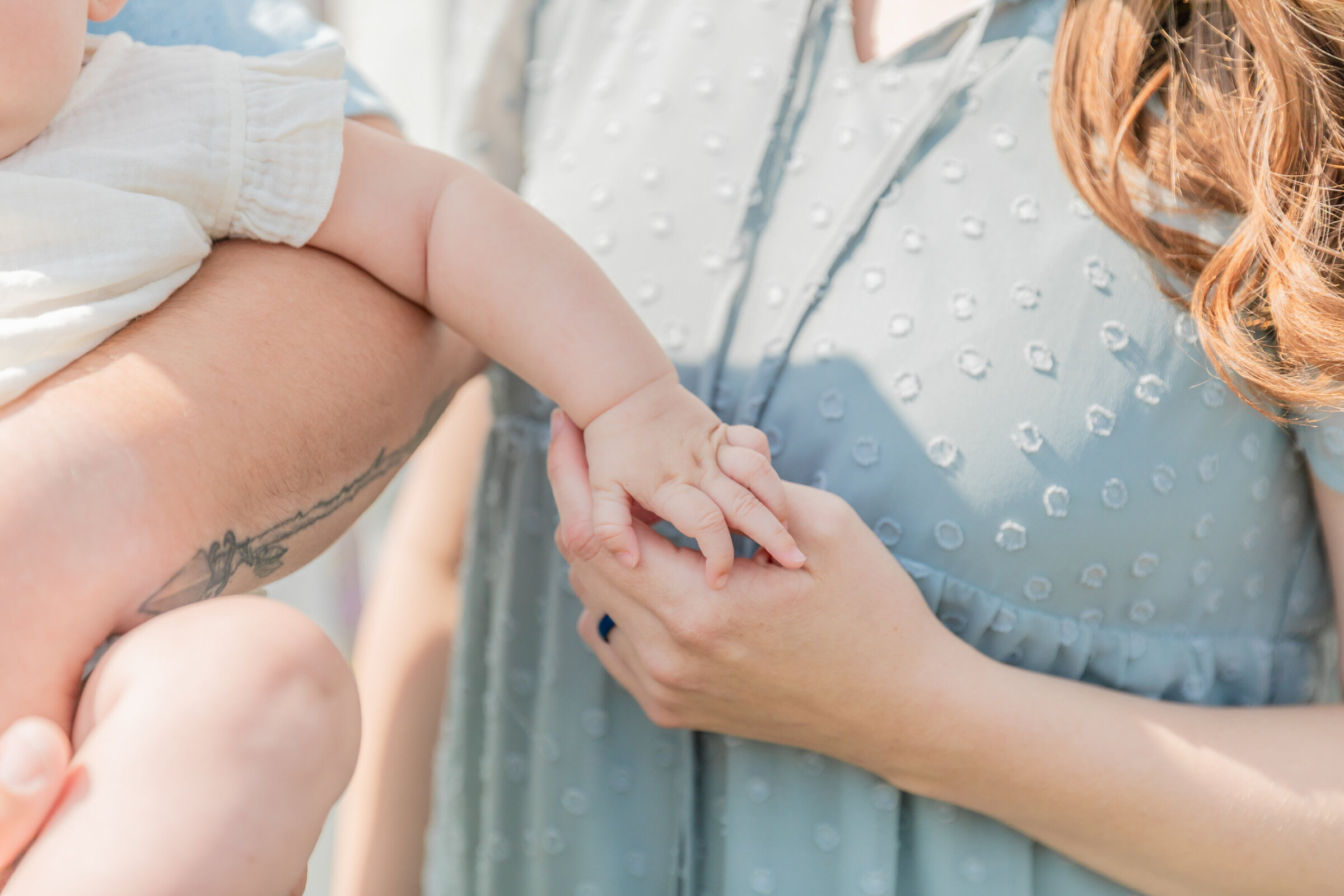 mother-daughter-holding-hands-detail