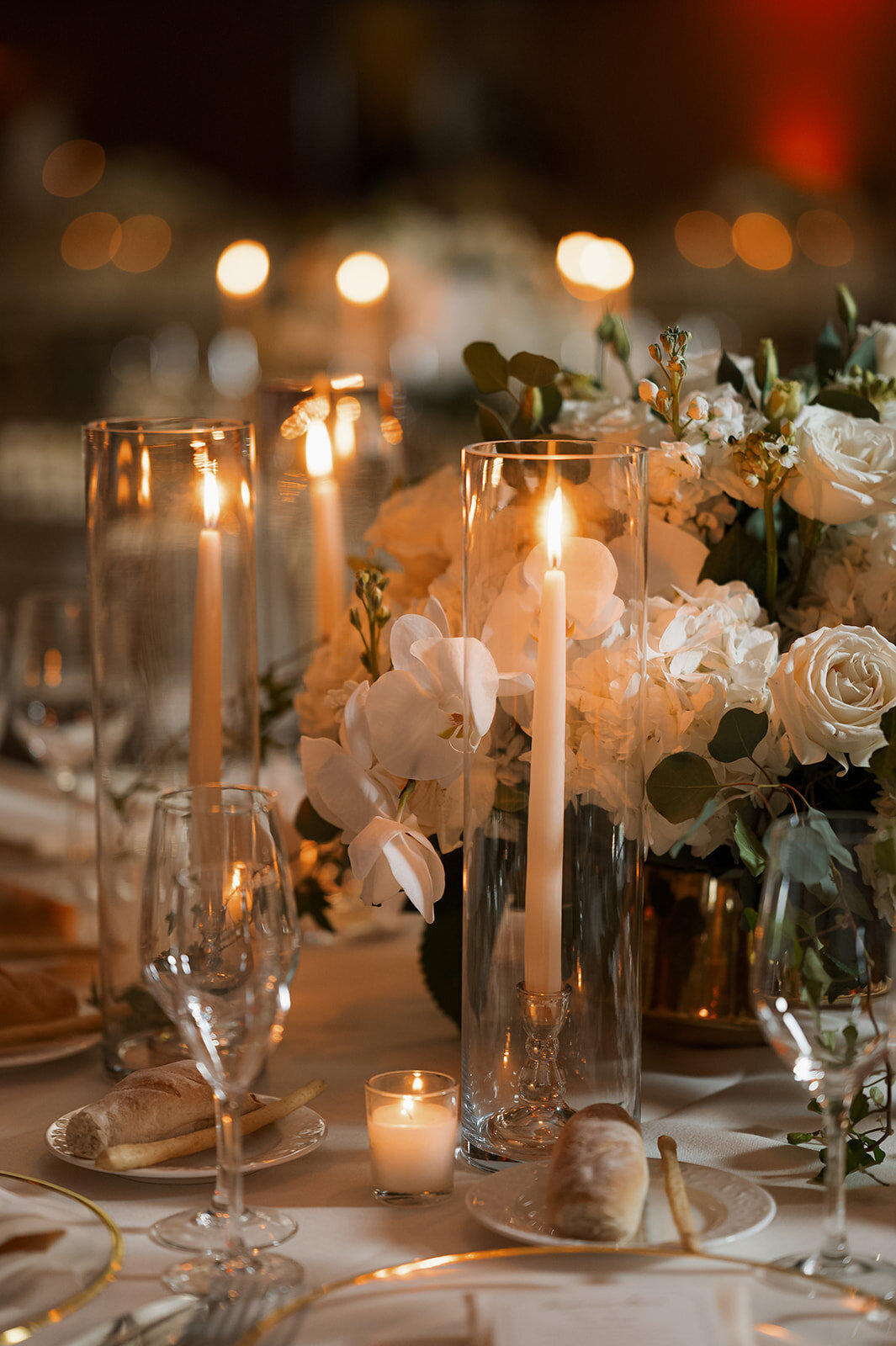 beautiful flowers at a wedding reception in the hudson valley during a winter wedding with diner by candlelight