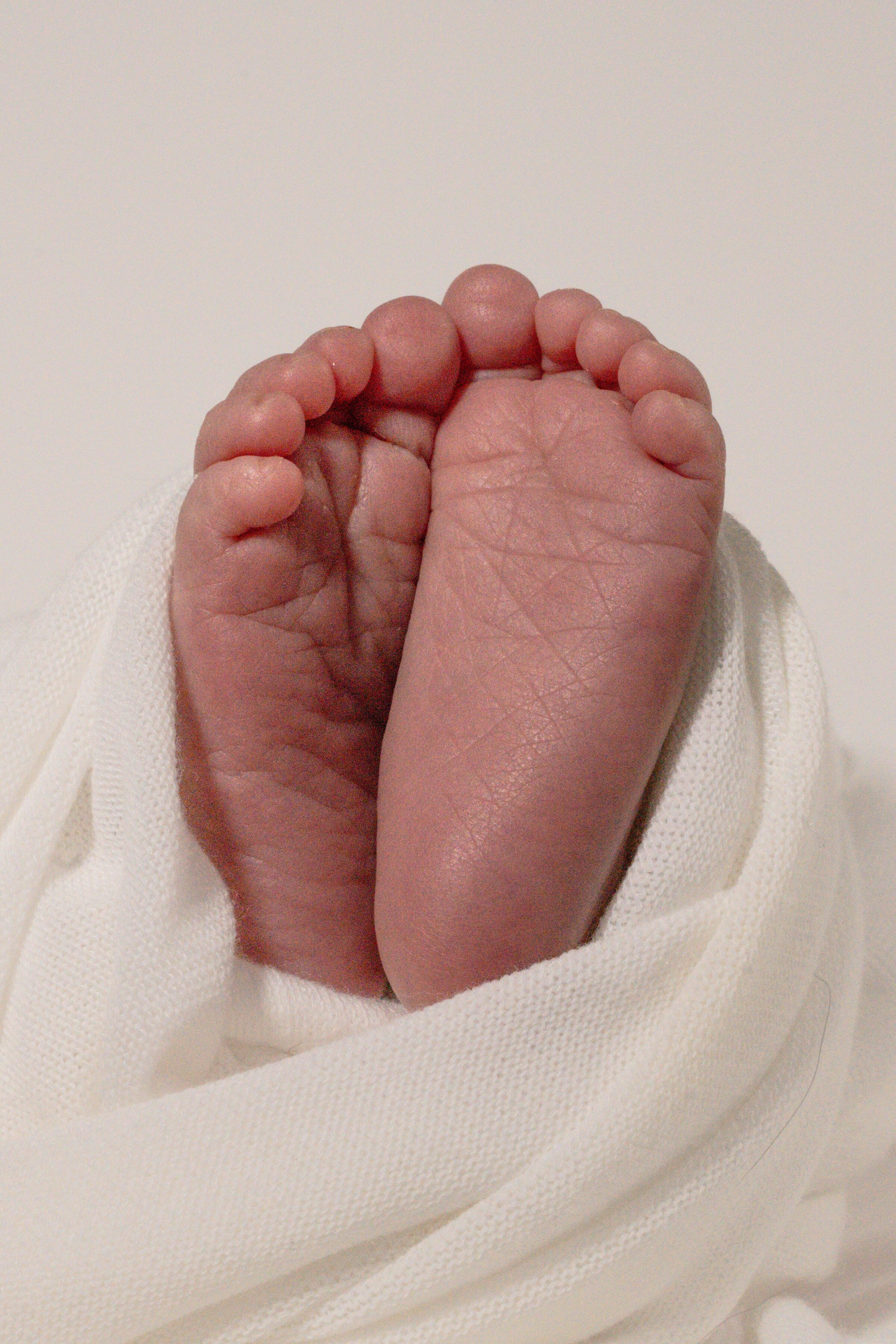 Close up of newborn babies feet